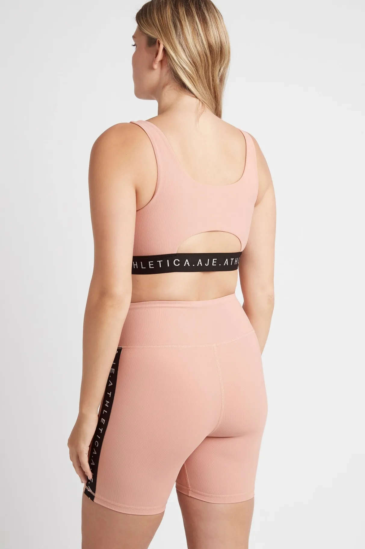 essential_mid_length_bike_shorts__9.webp Fashion Aje ATHLETICA Essential Mid Length Bike Shorts 601 Sunset Pink