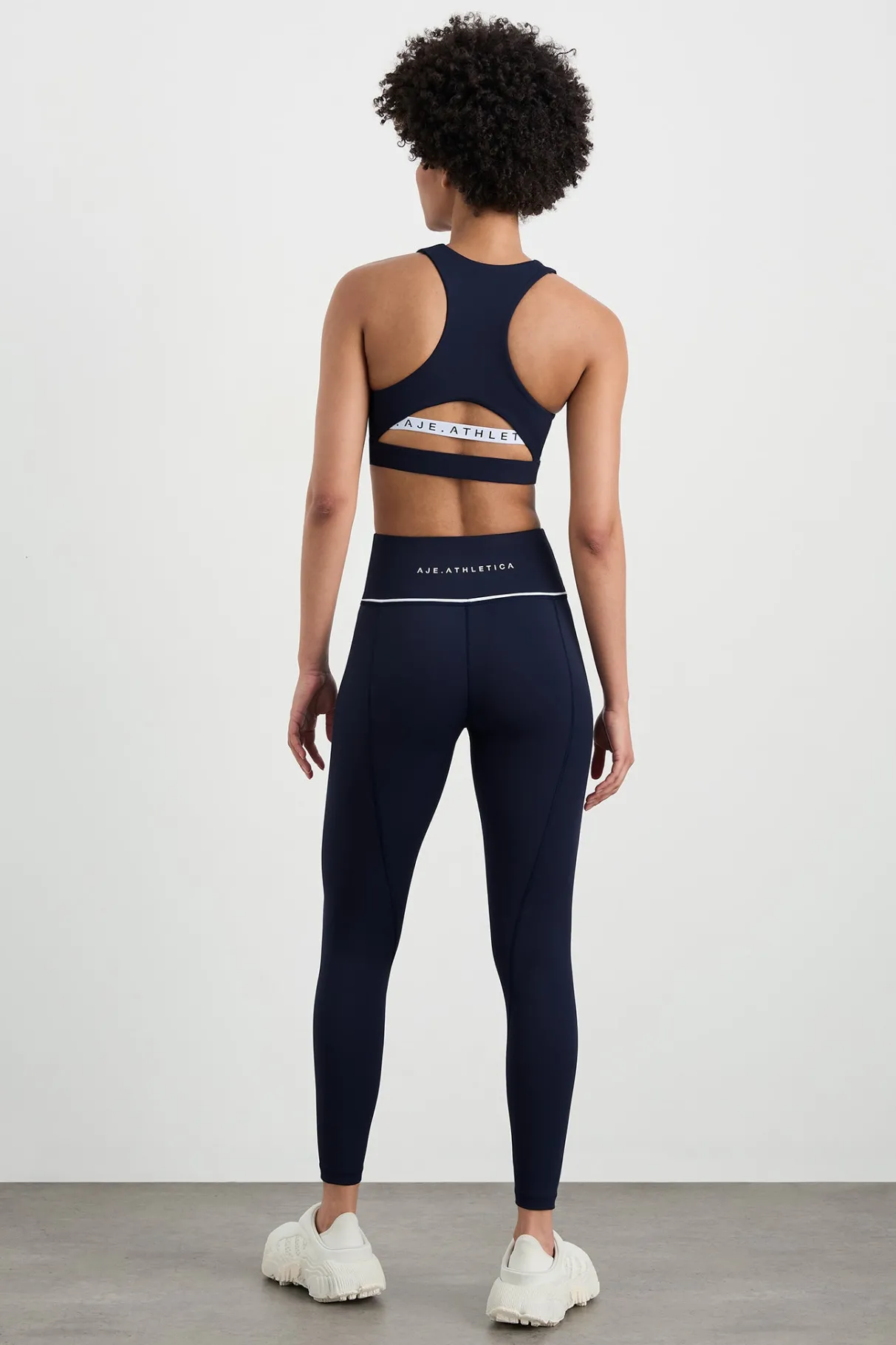 high_neck_sports_bra__4.webp Online Aje ATHLETICA High Neck Sports Bra 374 Galaxy Blue