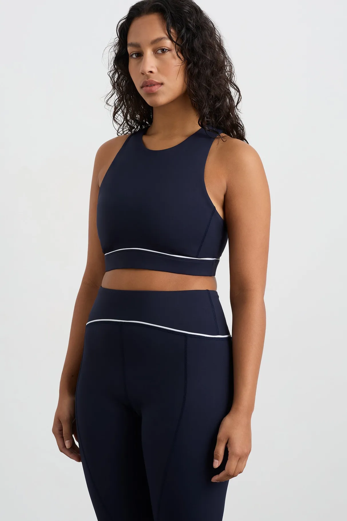 high_neck_sports_bra__5.webp Online Aje ATHLETICA High Neck Sports Bra 374 Galaxy Blue