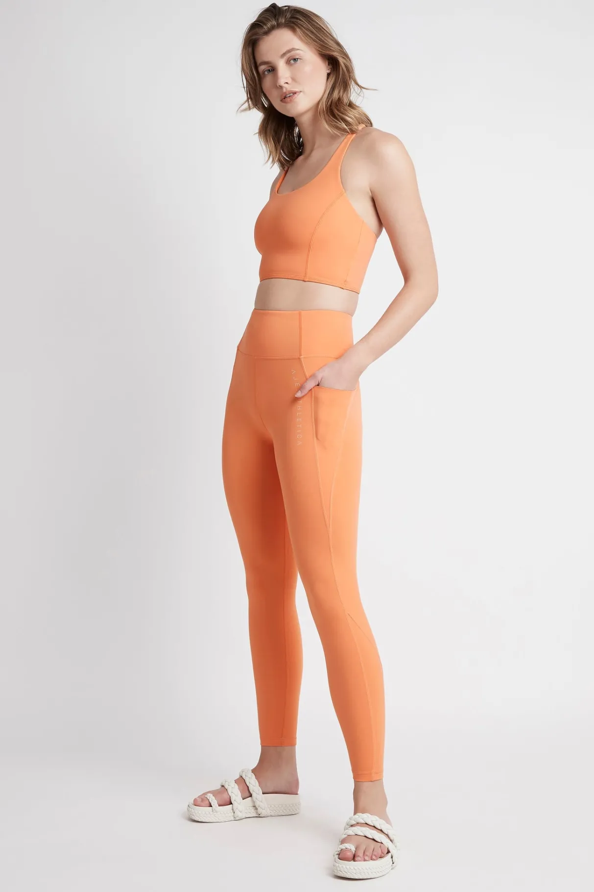 high_rise__logo_legging__2.webp Best Aje ATHLETICA High Rise 7/8 Logo Legging 203 Tangerine Orange-Sand
