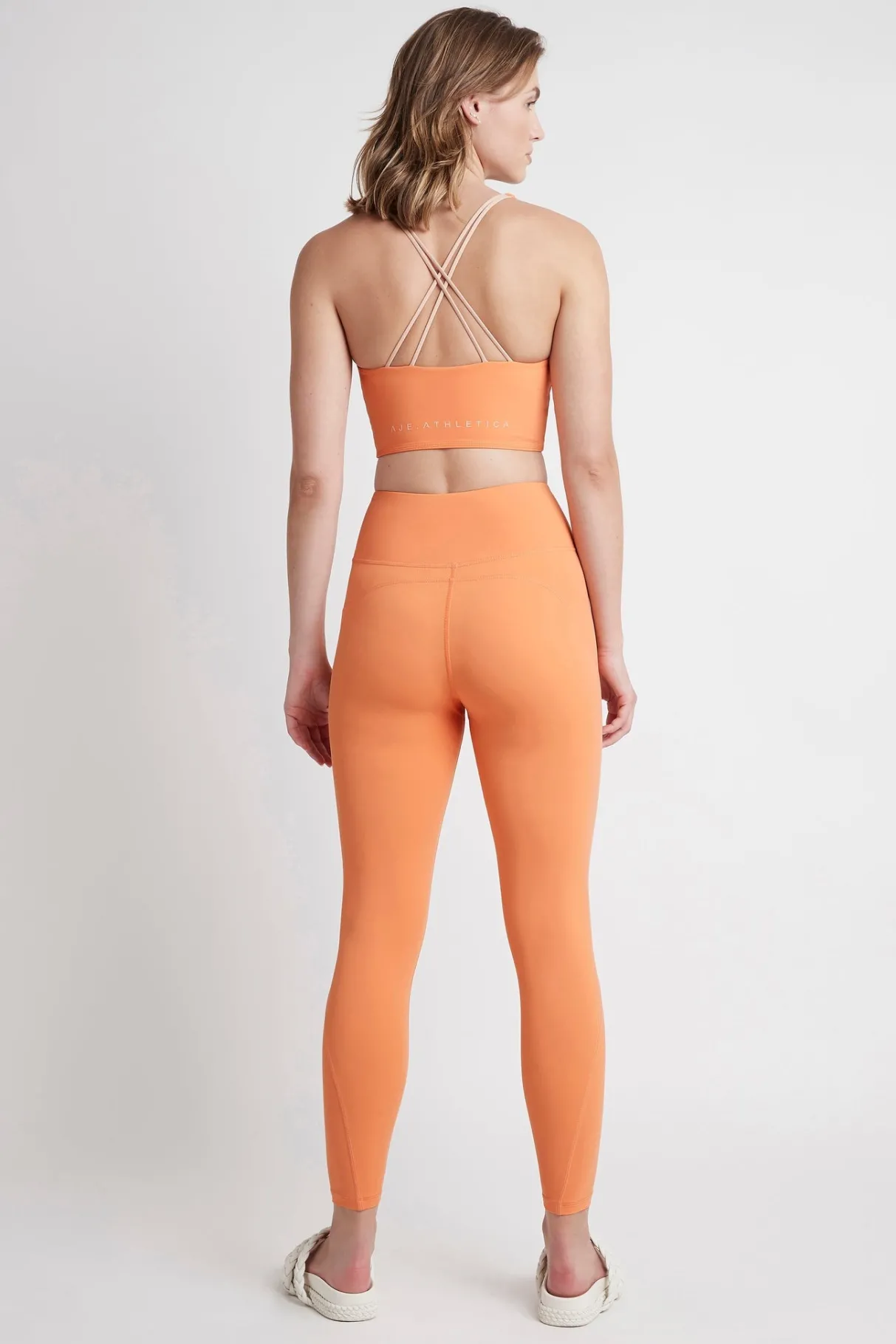 high_rise__logo_legging__4.webp Best Aje ATHLETICA High Rise 7/8 Logo Legging 203 Tangerine Orange-Sand
