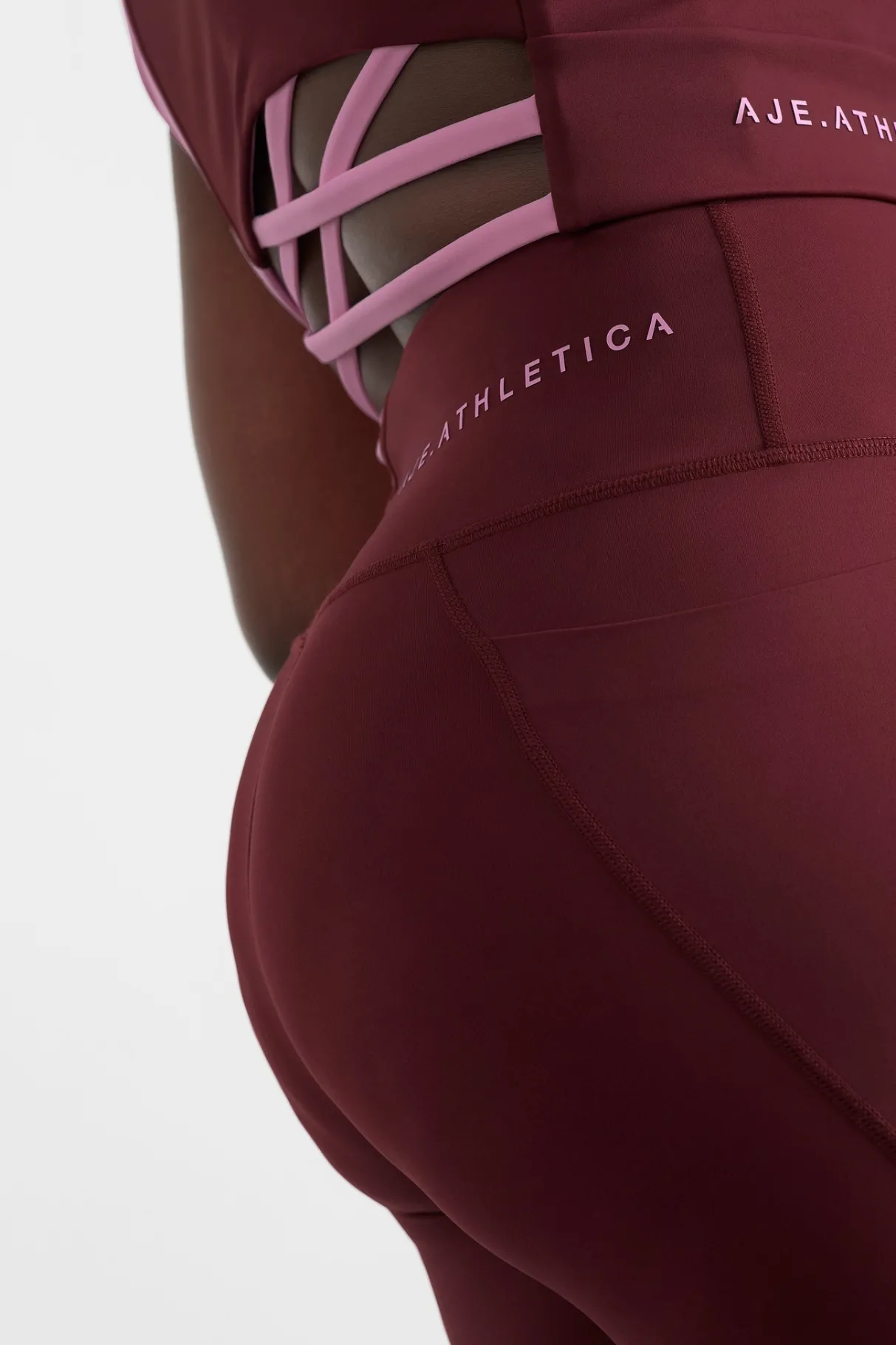 high_rise_colour_block__legging__8.webp Shop Aje ATHLETICA High Rise Colour Block 7/8 Legging 226 Burnt Burgundy/Bonbon Pink