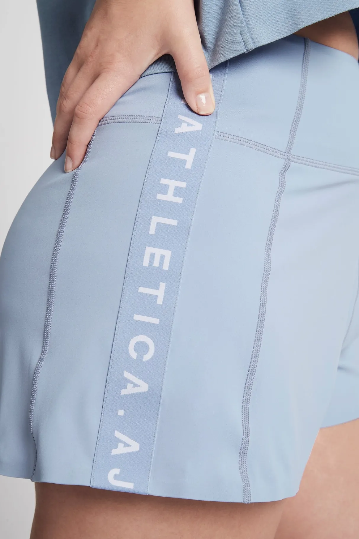 high_rise_logotape_running_short__8.webp Flash Sale Aje ATHLETICA High Rise Logotape Running Short 602 Steel Blue