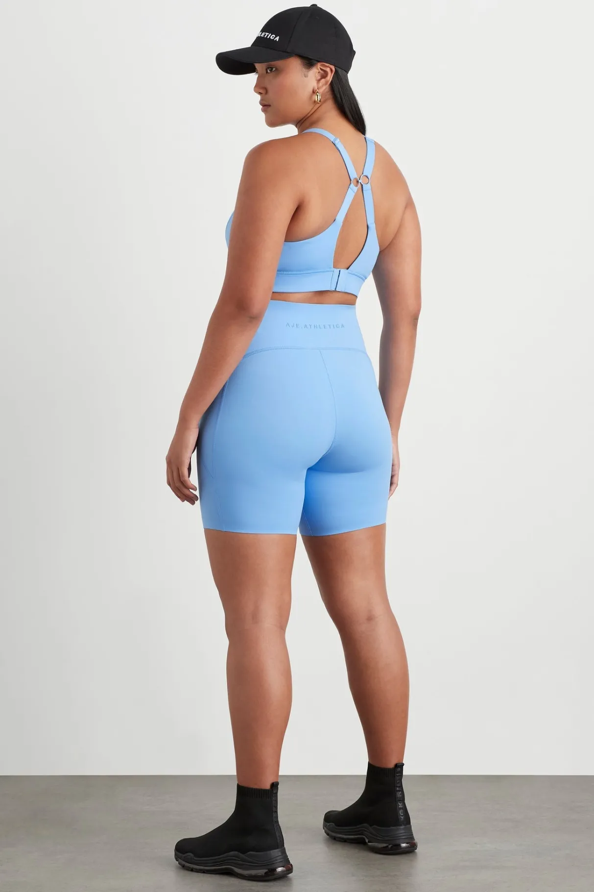 high_rise_mid_length_bike_short__9-1.webp Outlet Aje ATHLETICA High Rise Mid Length Bike Short 615 Cerulean Blue