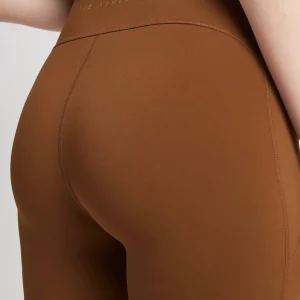 Discount Aje ATHLETICA High Rise Mid Length Embossed Bike Short 615 Coffee/Gold