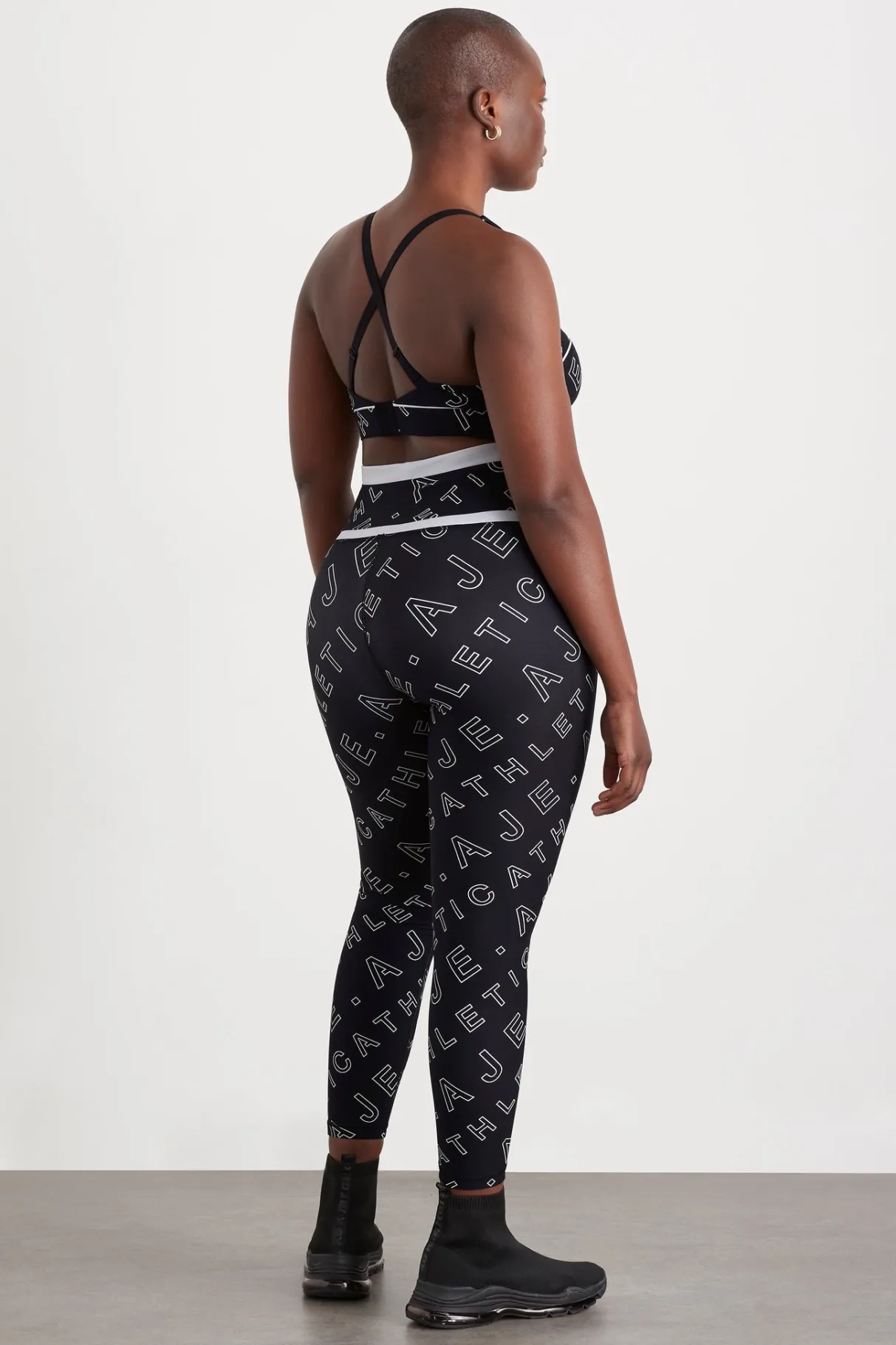 high_rise_piping__legging__10.webp New Aje ATHLETICA High Rise Piping 7/8 Legging 230 Black Fineline Logo