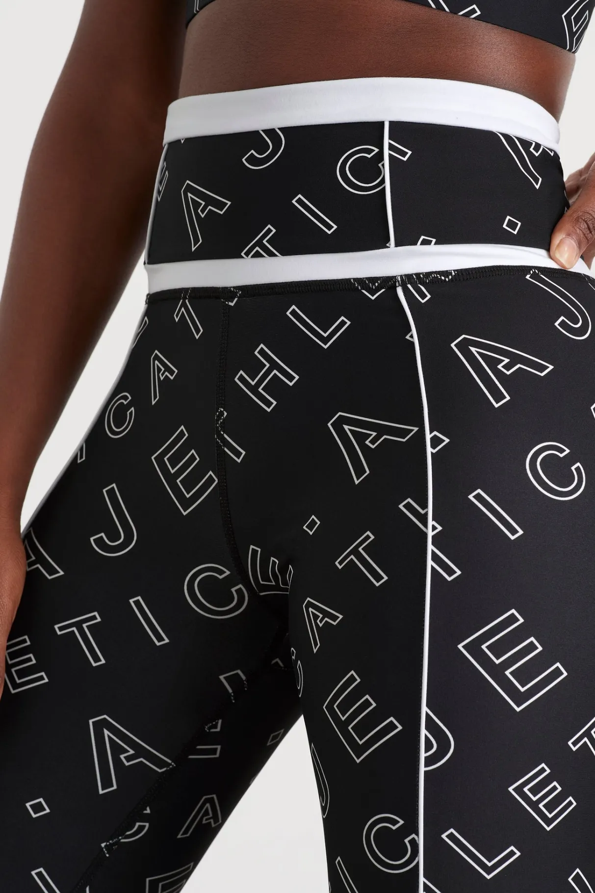 high_rise_piping__legging__4.webp New Aje ATHLETICA High Rise Piping 7/8 Legging 230 Black Fineline Logo