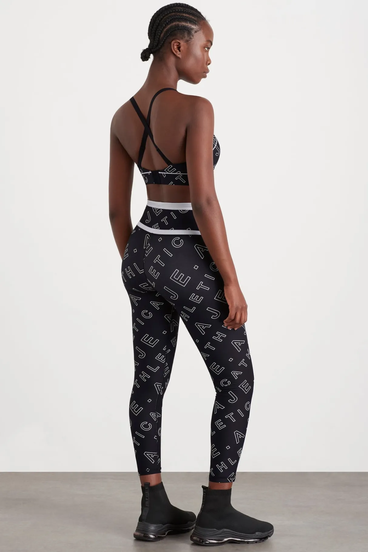 high_rise_piping__legging__5.webp New Aje ATHLETICA High Rise Piping 7/8 Legging 230 Black Fineline Logo