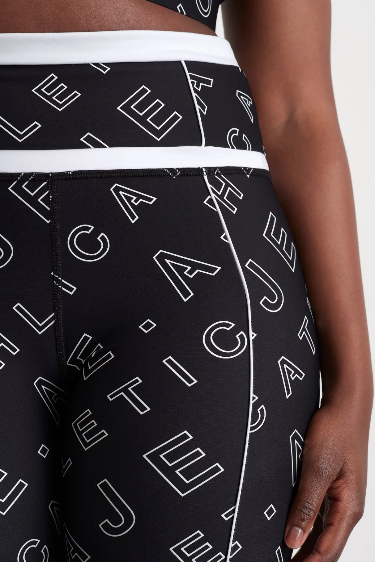high_rise_piping__legging__9.webp New Aje ATHLETICA High Rise Piping 7/8 Legging 230 Black Fineline Logo