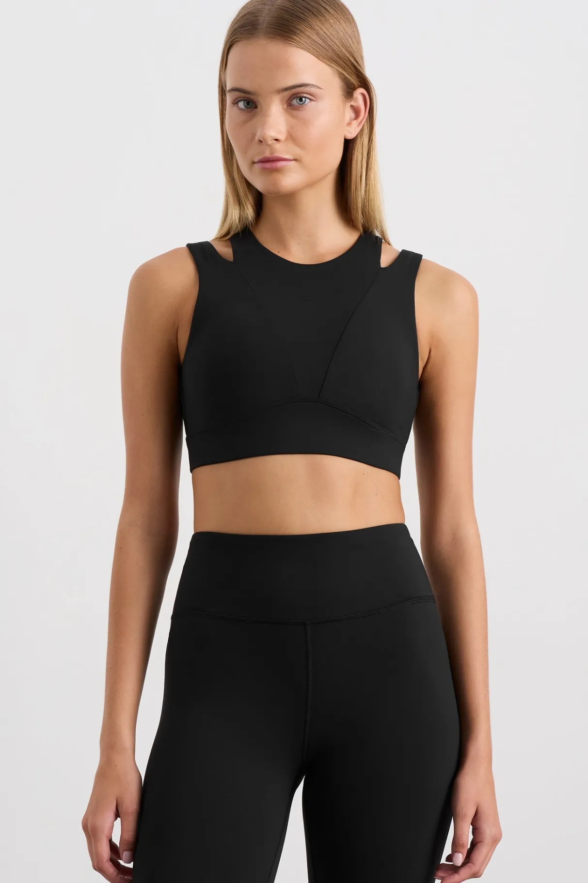 layered_cut_out_sports_bra__0.webp Store Aje ATHLETICA Layered Cut Out Sports Bra 385 Black
