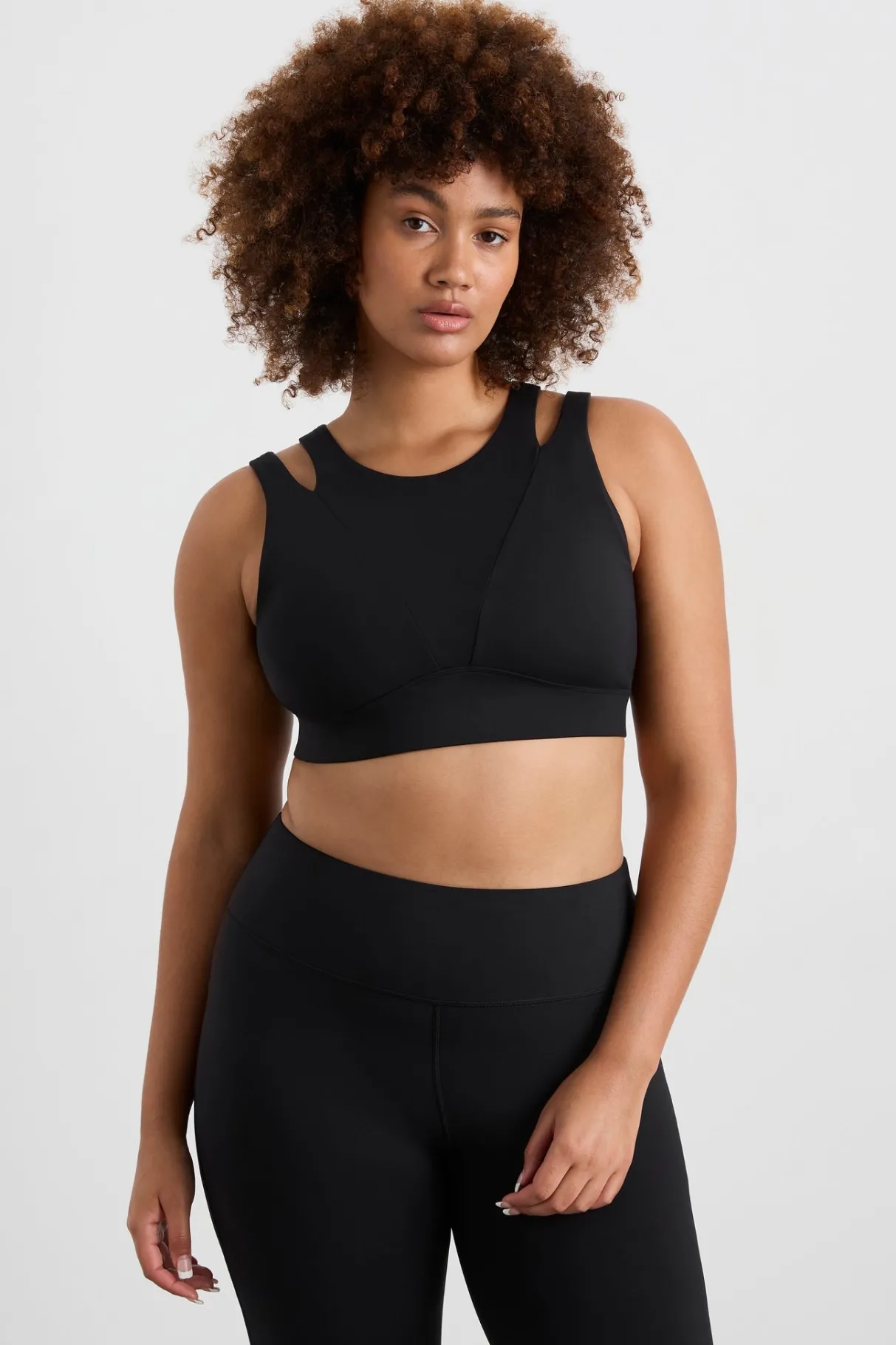 layered_cut_out_sports_bra__11.webp Store Aje ATHLETICA Layered Cut Out Sports Bra 385 Black