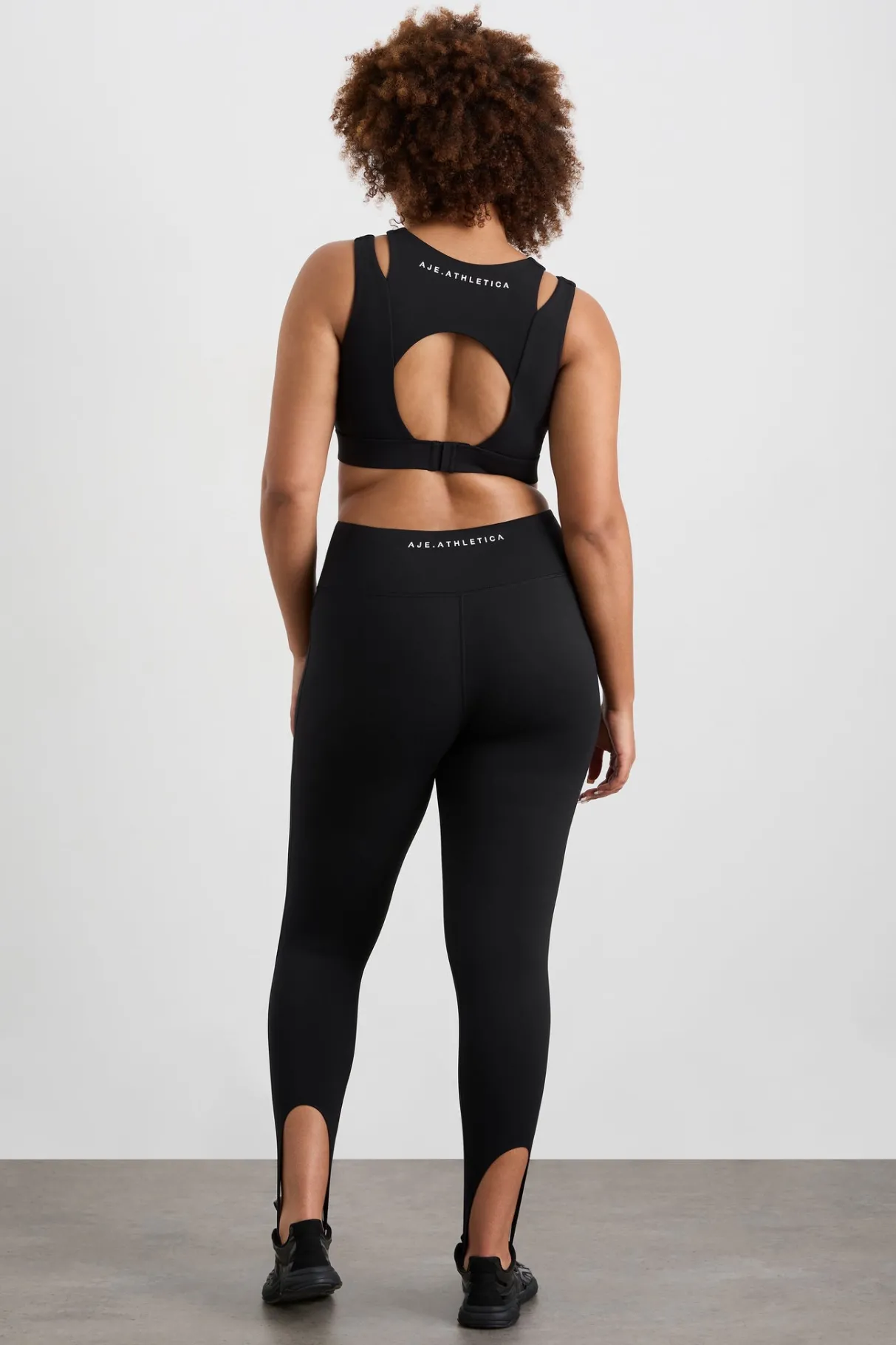 layered_cut_out_sports_bra__14.webp Store Aje ATHLETICA Layered Cut Out Sports Bra 385 Black