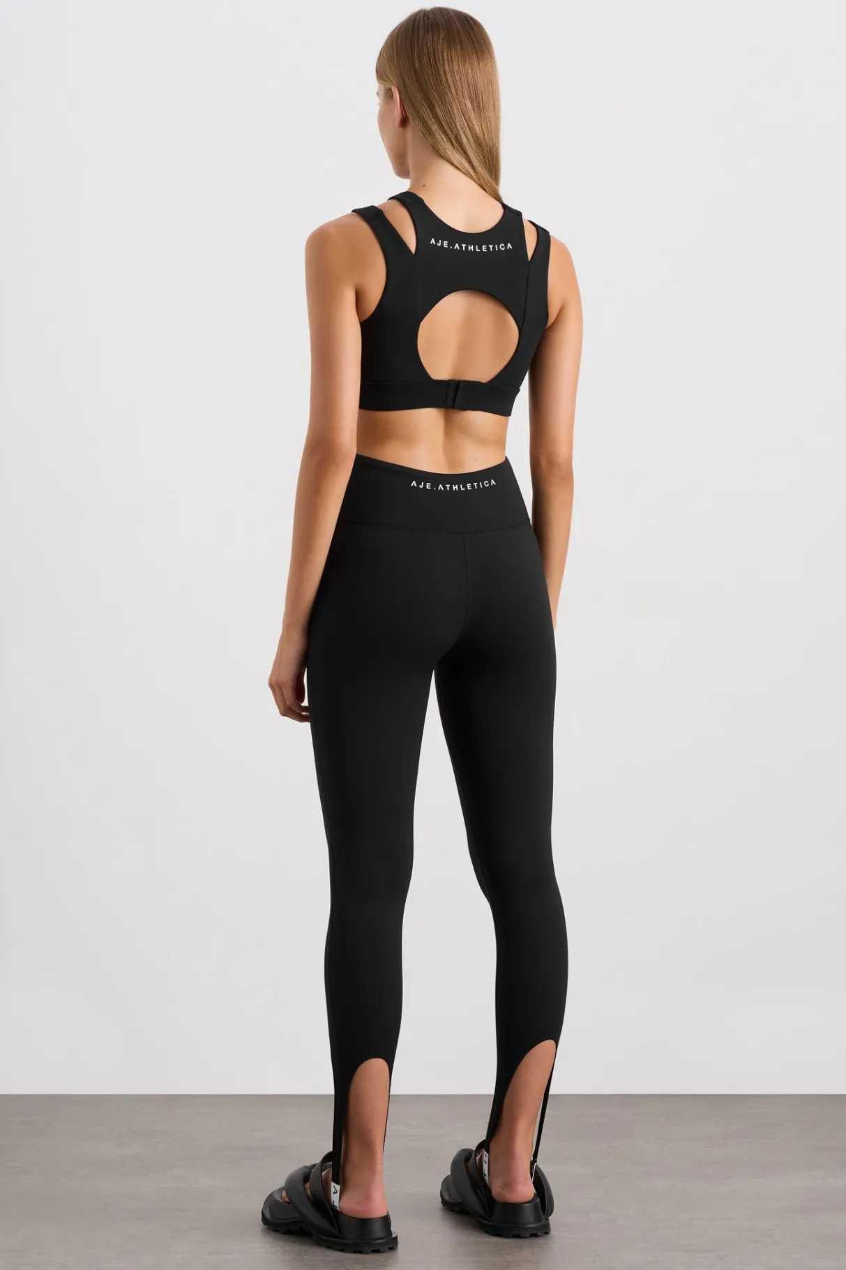 layered_cut_out_sports_bra__5.webp Store Aje ATHLETICA Layered Cut Out Sports Bra 385 Black