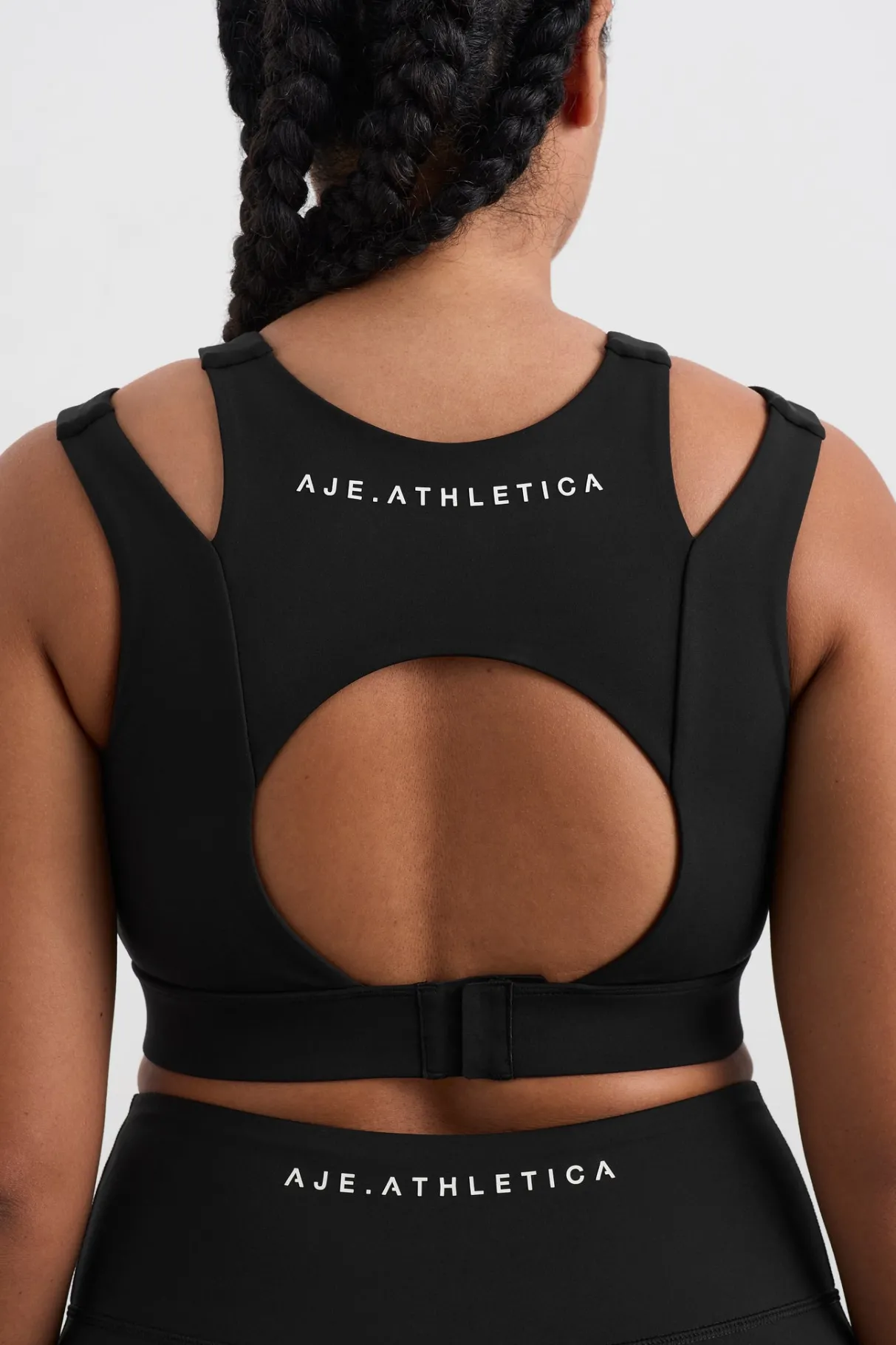layered_cut_out_sports_bra__9.webp Store Aje ATHLETICA Layered Cut Out Sports Bra 385 Black