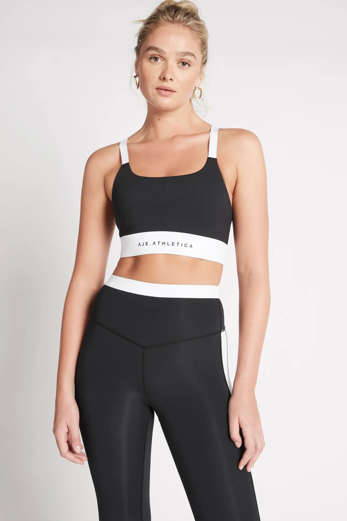 light_support_sports_bra__0.webp Discount Aje ATHLETICA Light Support Sports Bra 320 Black/White
