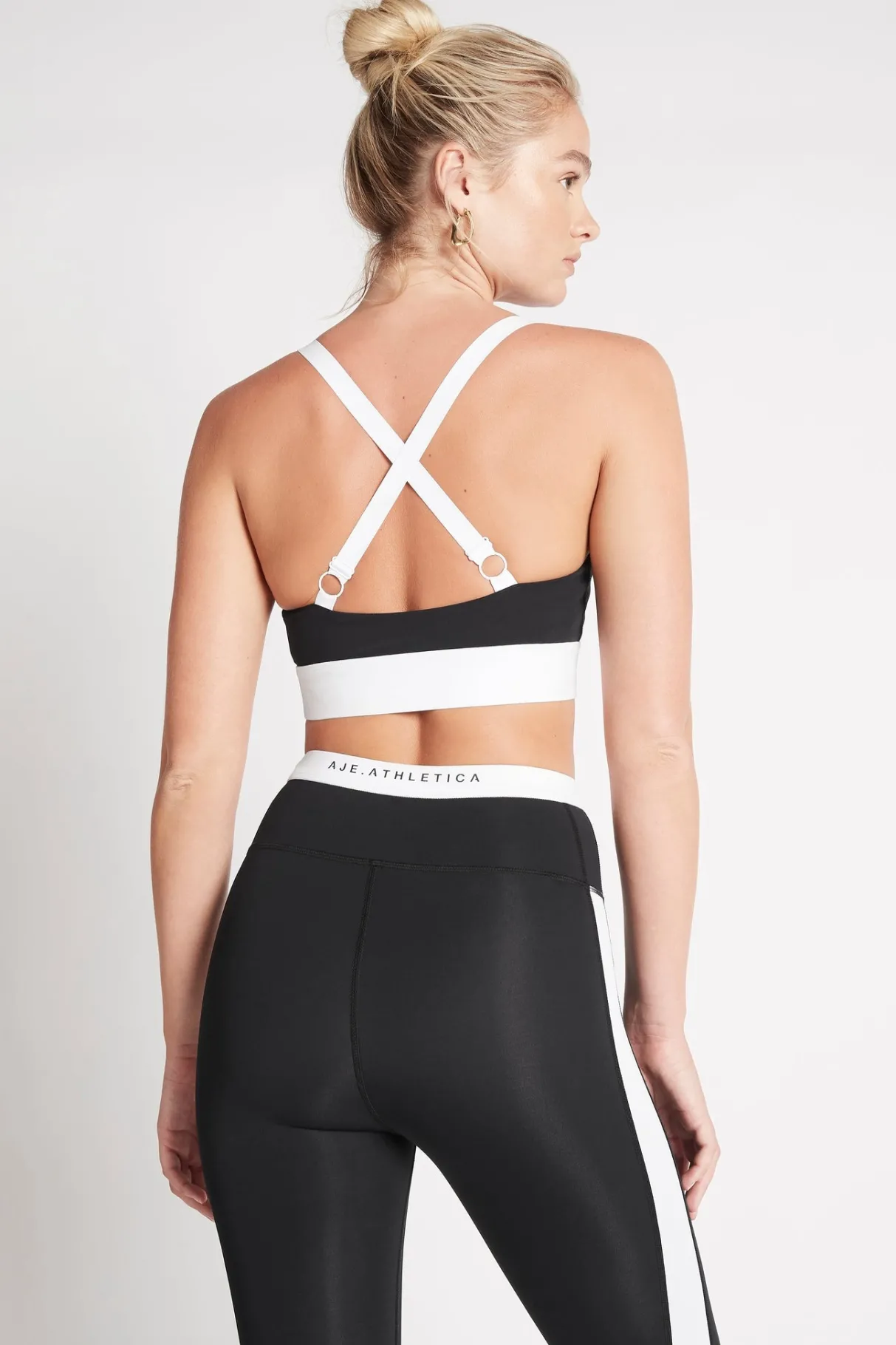 light_support_sports_bra__4.webp Discount Aje ATHLETICA Light Support Sports Bra 320 Black/White