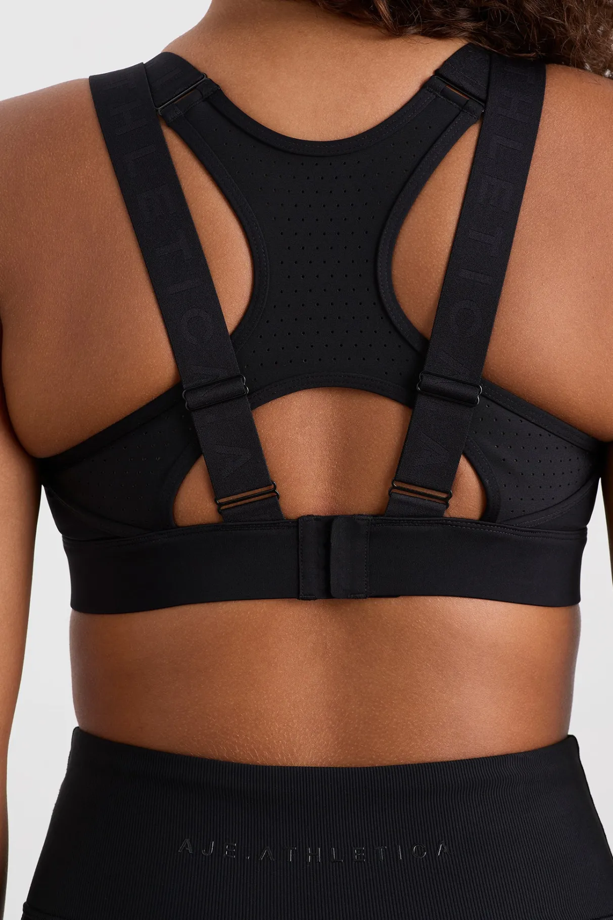 logo_crossback_sports_bra__7.webp Store Aje ATHLETICA Logo Crossback Sports Bra 395 Black