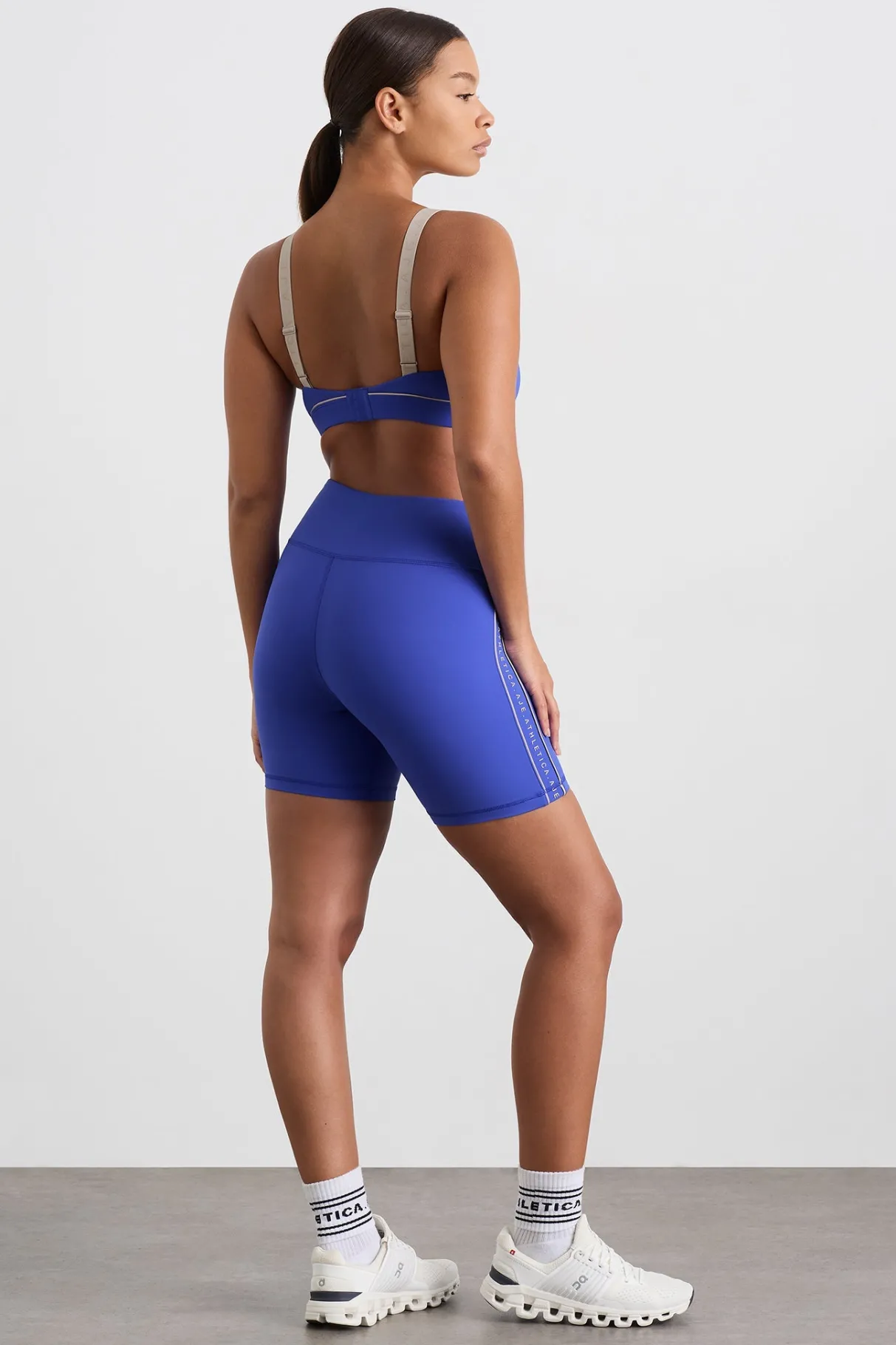 logo_notch_bike_short__10.webp Online Aje ATHLETICA Logo Notch Bike Short 639 Marine Blue Latte Beige