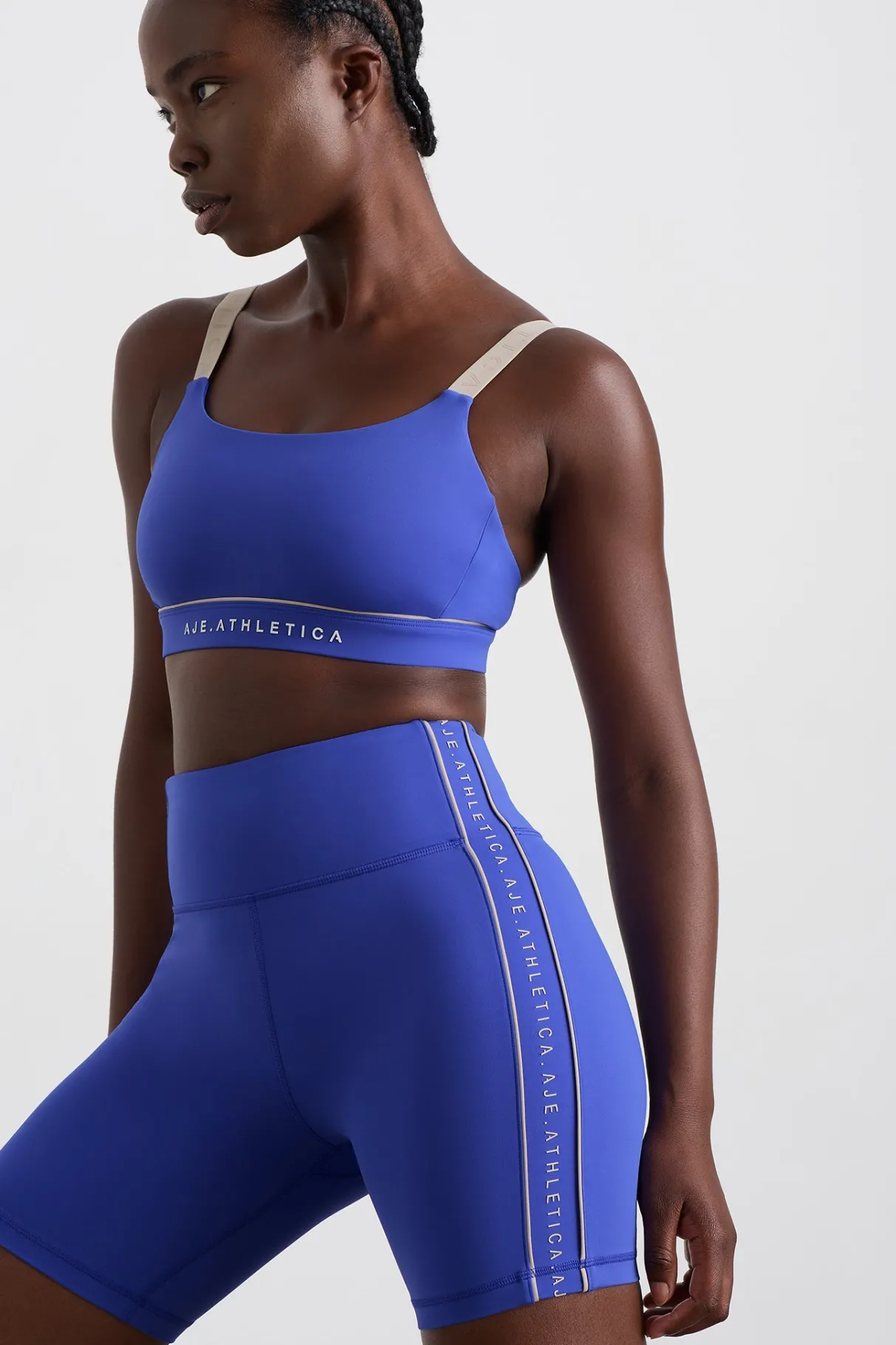 logo_notch_bike_short__4.webp Online Aje ATHLETICA Logo Notch Bike Short 639 Marine Blue Latte Beige