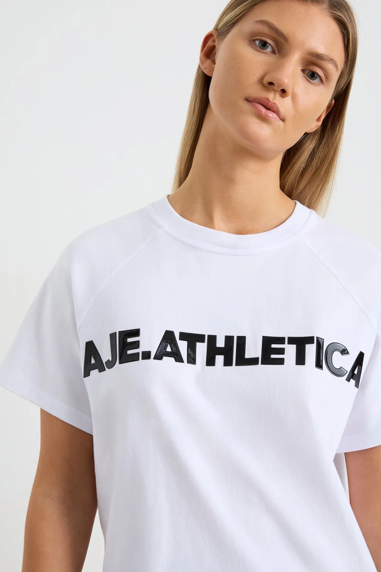 logo_raglan_tshirt__3.webp Cheap Aje ATHLETICA Logo Raglan T-Shirt 110 White/Black