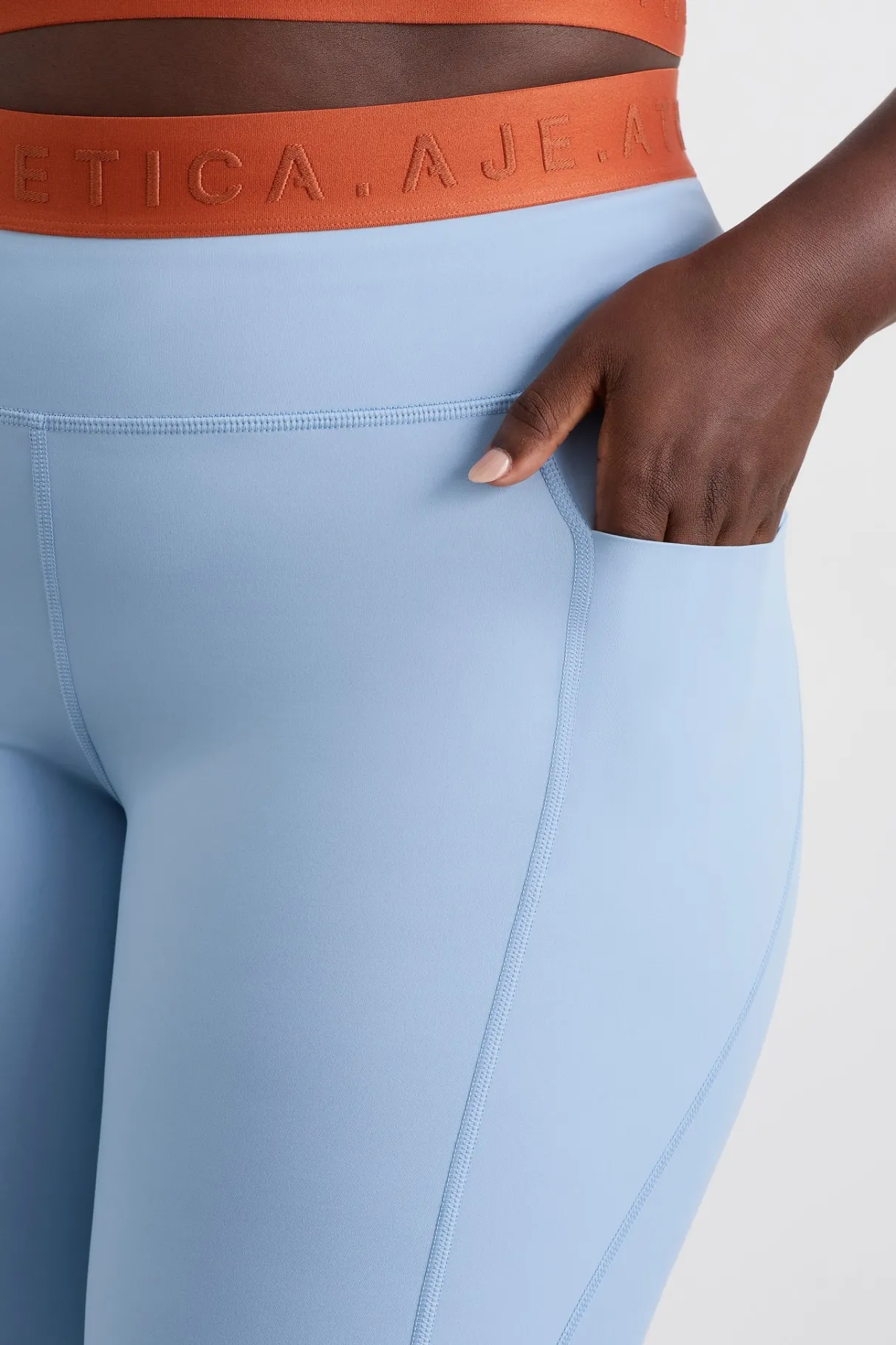 logo_tape_legging__13-1.webp Cheap Aje ATHLETICA Logo Tape Legging 208 Steel Blue Copper Orange