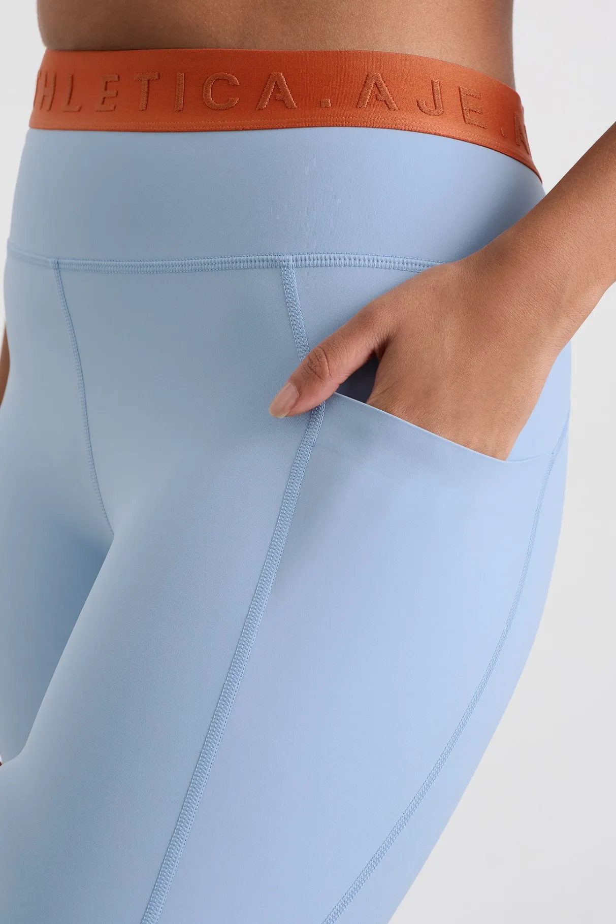 logo_tape_legging__8-1.webp Cheap Aje ATHLETICA Logo Tape Legging 208 Steel Blue Copper Orange