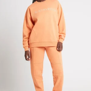 Shop Aje ATHLETICA Logo Trackpants 502 Orange Marle