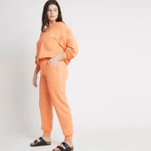 Shop Aje ATHLETICA Logo Trackpants 502 Orange Marle