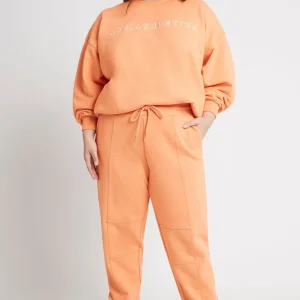 Shop Aje ATHLETICA Logo Trackpants 502 Orange Marle