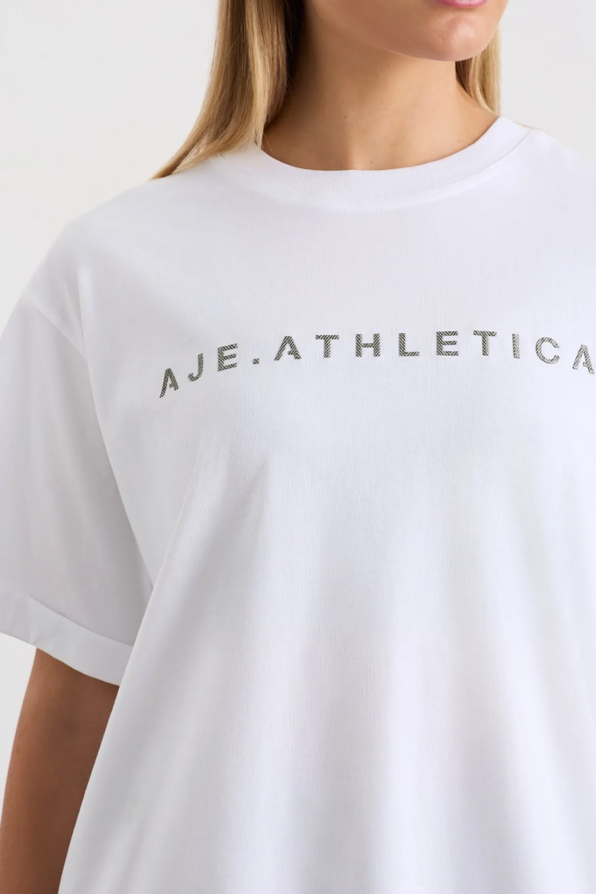 logo_tshirt__3-1.webp Shop Aje ATHLETICA Logo T-Shirt 102 White/Herringbone