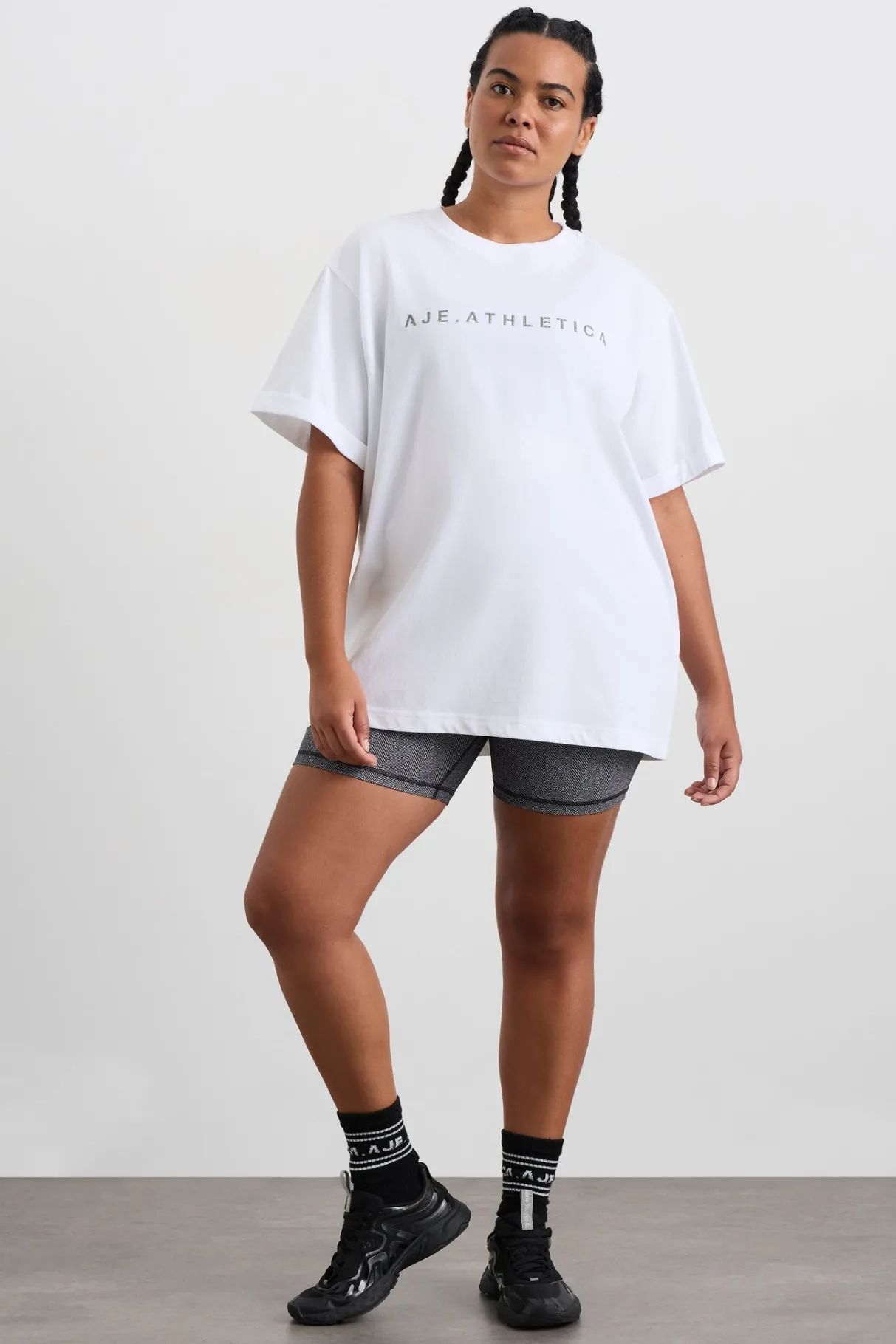 logo_tshirt__6-1.webp Shop Aje ATHLETICA Logo T-Shirt 102 White/Herringbone
