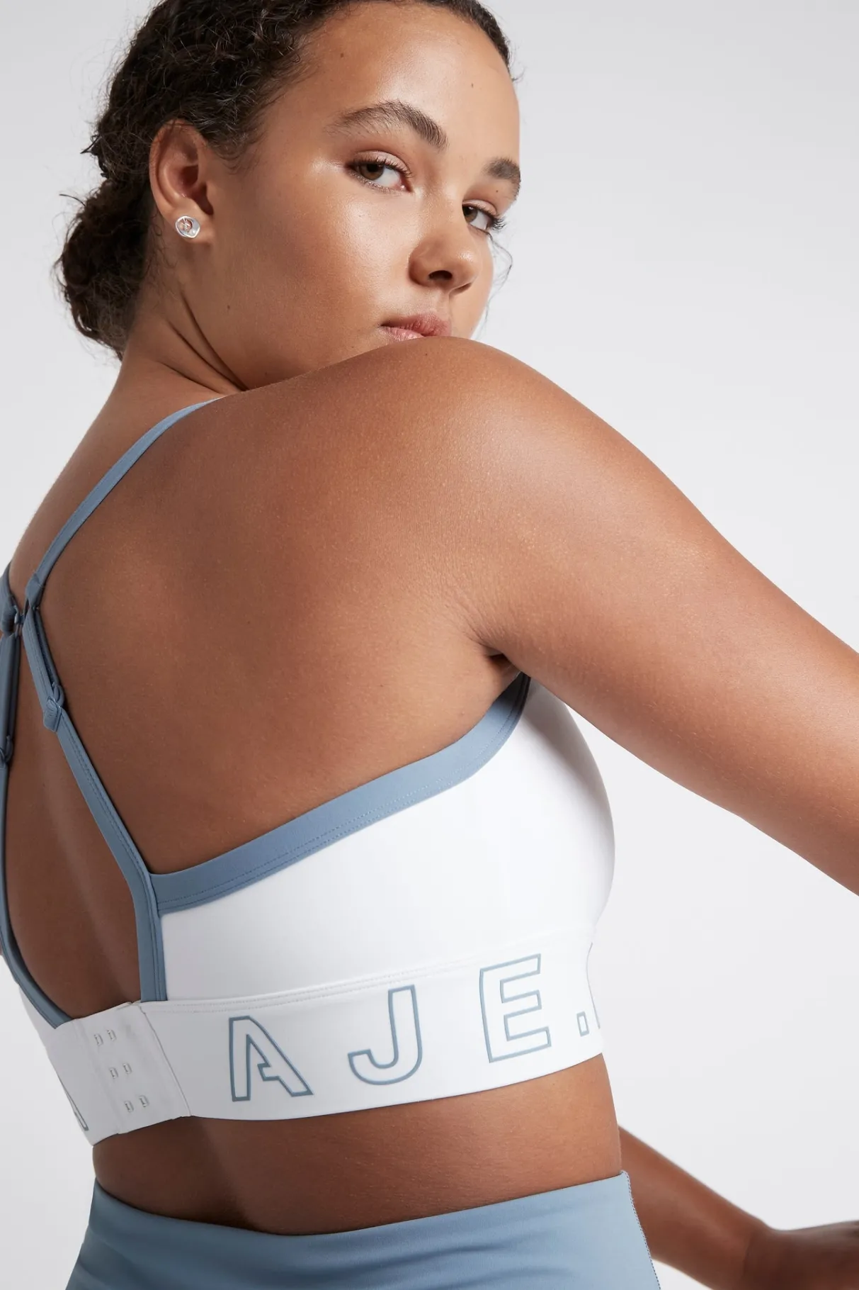 logotape_adjustable_strap_sports_bra__10-1.webp Online Aje ATHLETICA Logotape Adjustable Strap Sports Bra 307 White/Storm Blue