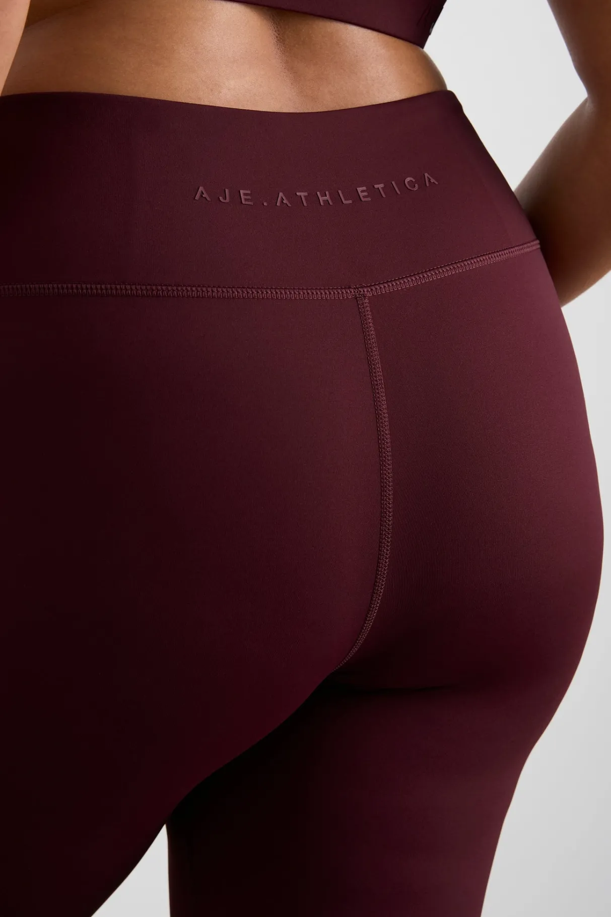 logotape_leggings__12.webp Hot Aje ATHLETICA 7/8 Logotape Leggings 203 Burgundy