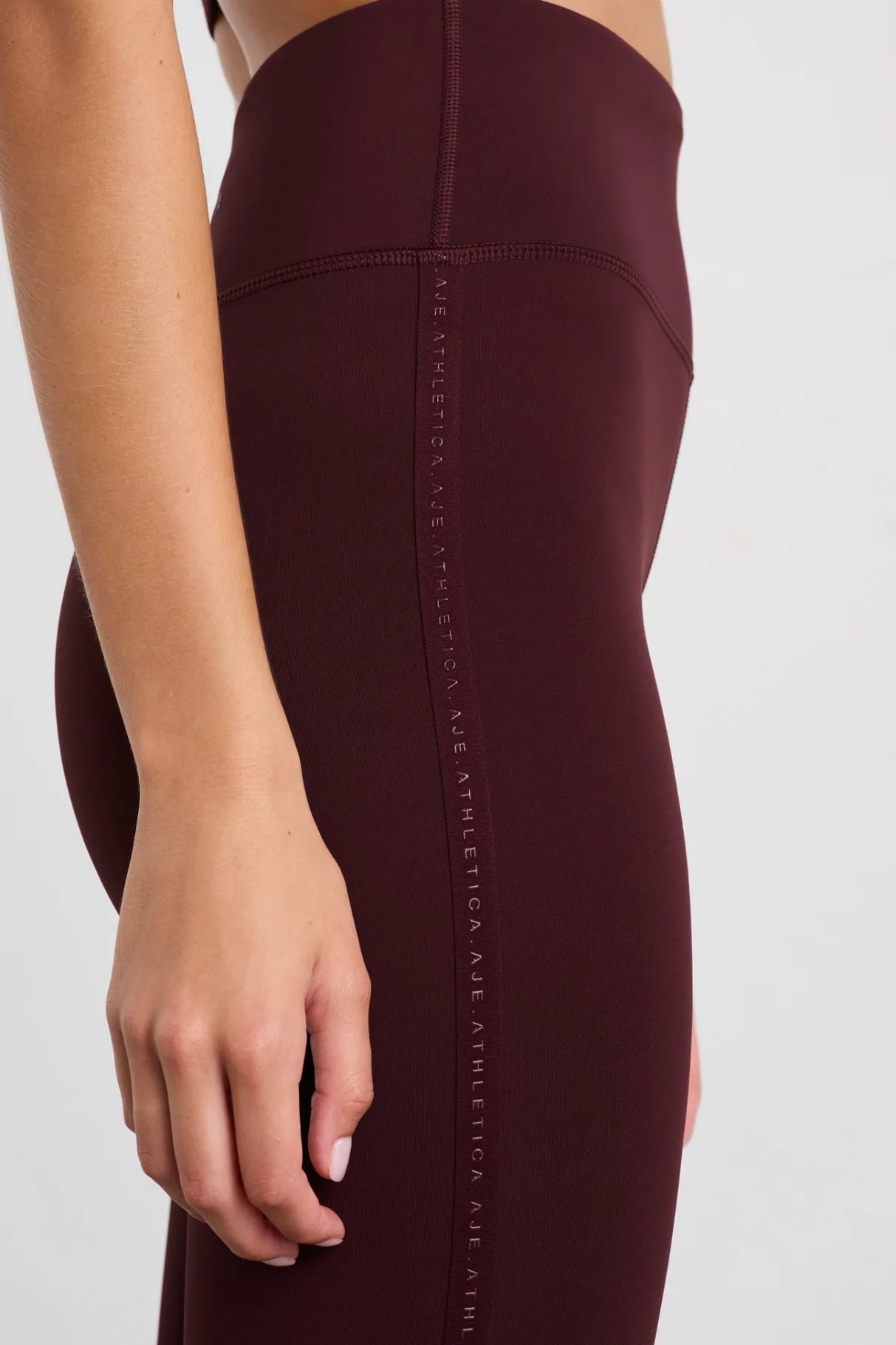 logotape_leggings__3.webp Hot Aje ATHLETICA 7/8 Logotape Leggings 203 Burgundy