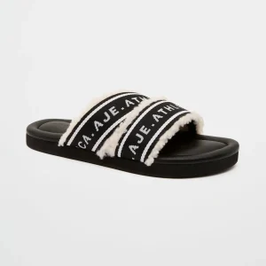 Shop Aje ATHLETICA Logotape Shearling Slides 938 Black/White