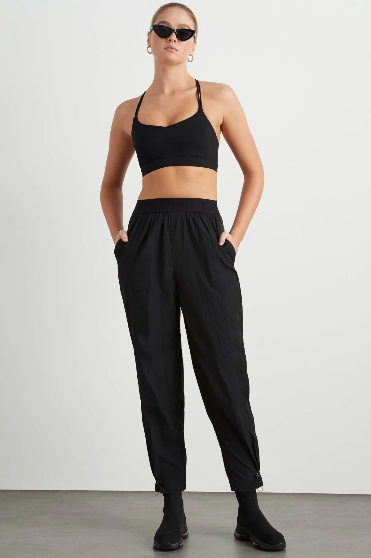 logotape_spray_trackpants__0.webp Fashion Aje ATHLETICA Logotape Spray Trackpants 511 Black