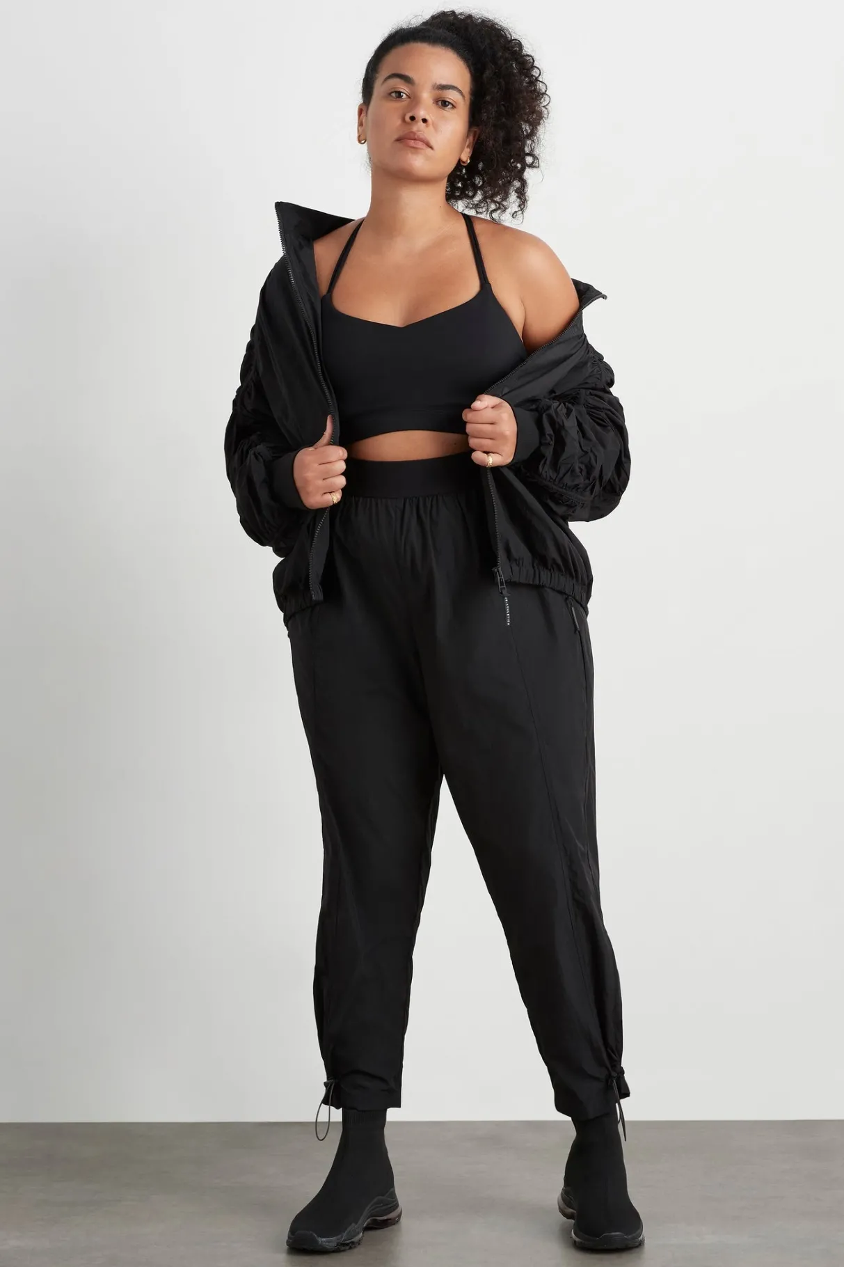 logotape_spray_trackpants__11.webp Fashion Aje ATHLETICA Logotape Spray Trackpants 511 Black