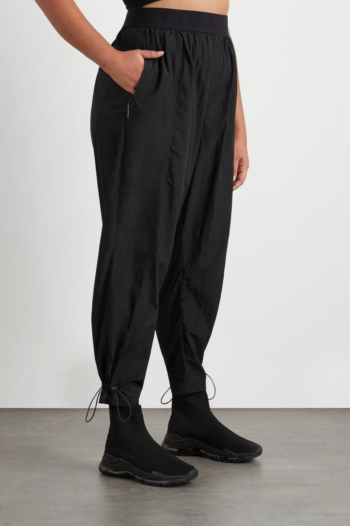 logotape_spray_trackpants__12.webp Fashion Aje ATHLETICA Logotape Spray Trackpants 511 Black