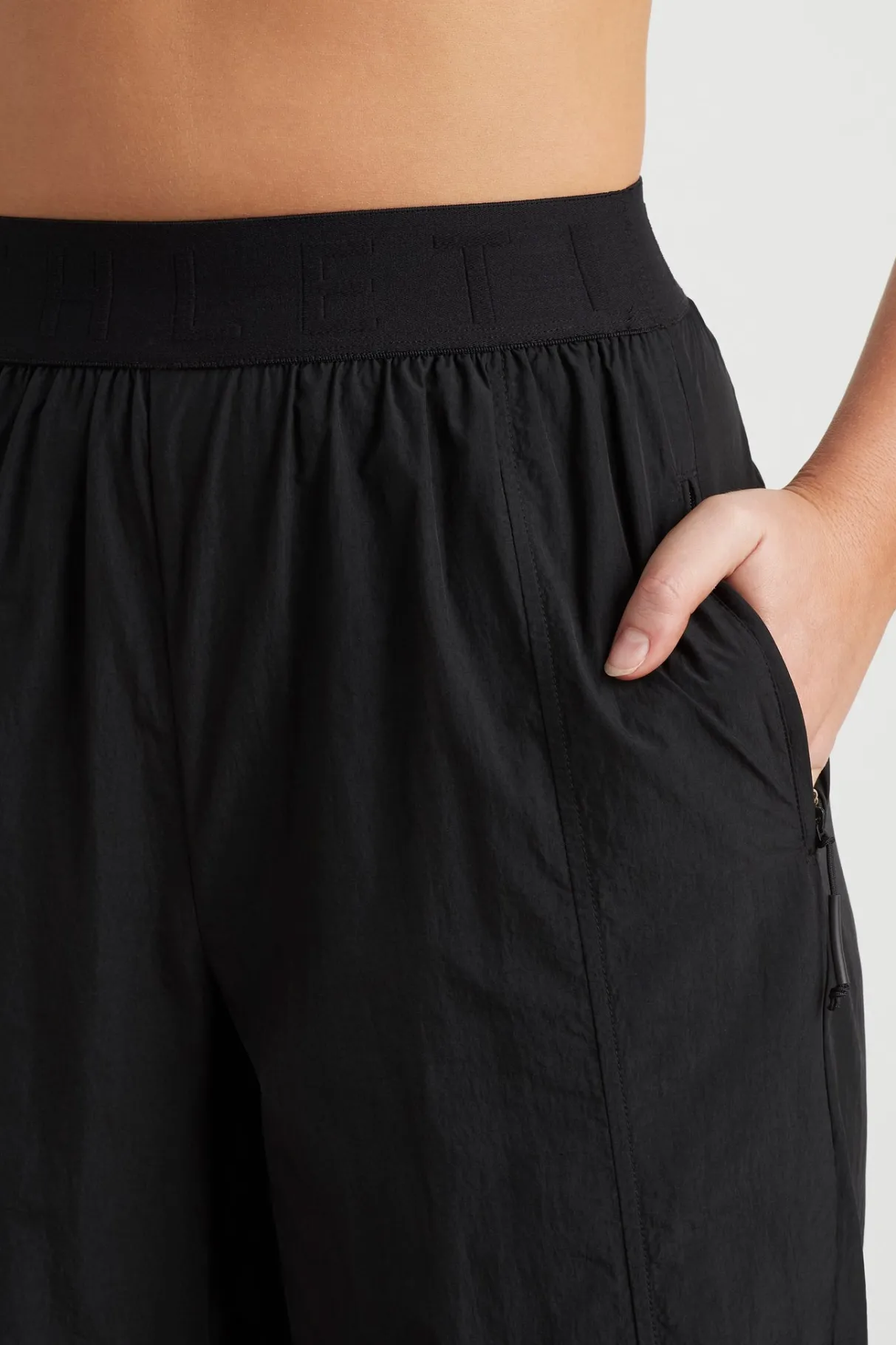 logotape_spray_trackpants__3.webp Fashion Aje ATHLETICA Logotape Spray Trackpants 511 Black