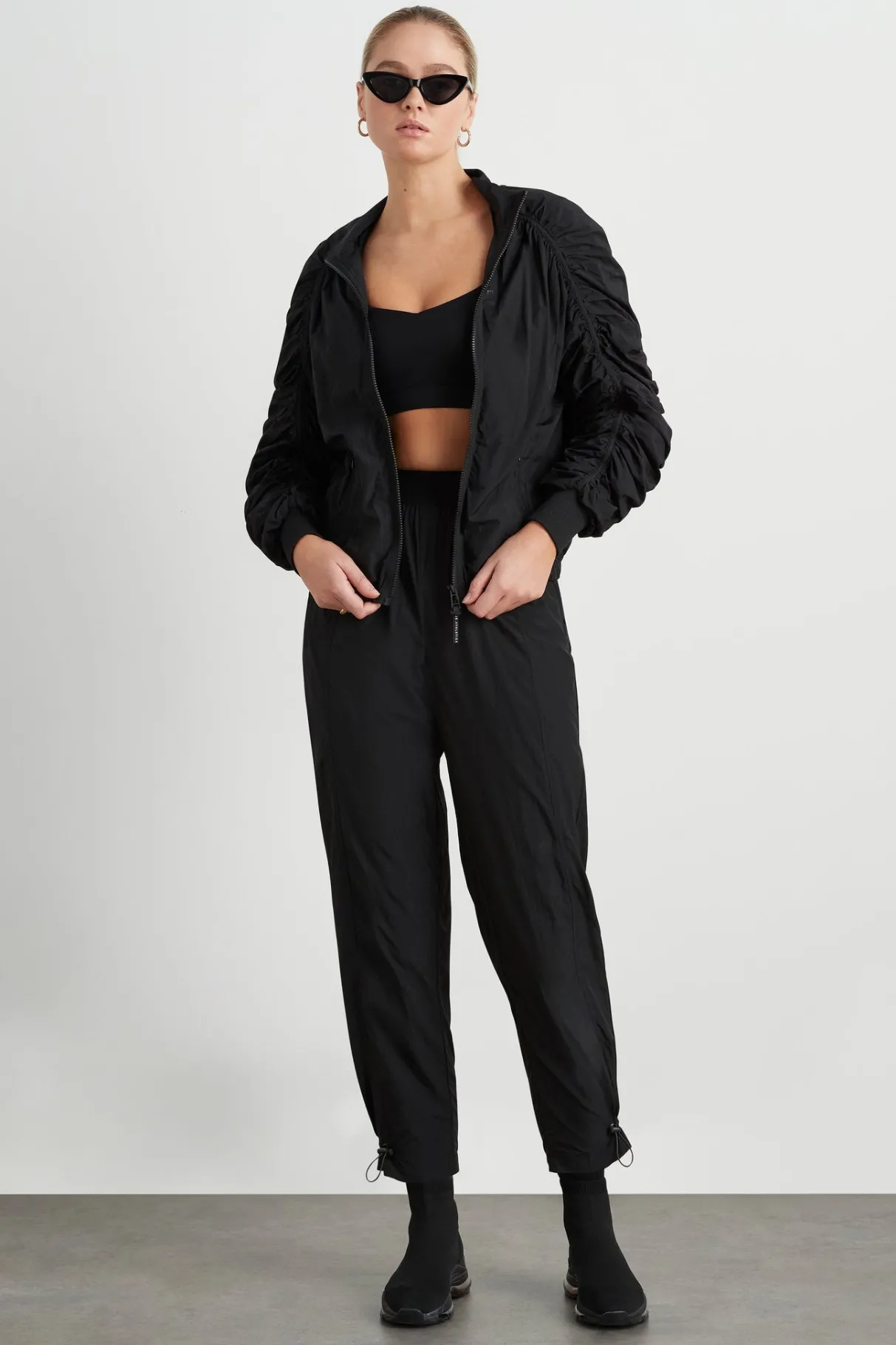 logotape_spray_trackpants__5.webp Fashion Aje ATHLETICA Logotape Spray Trackpants 511 Black