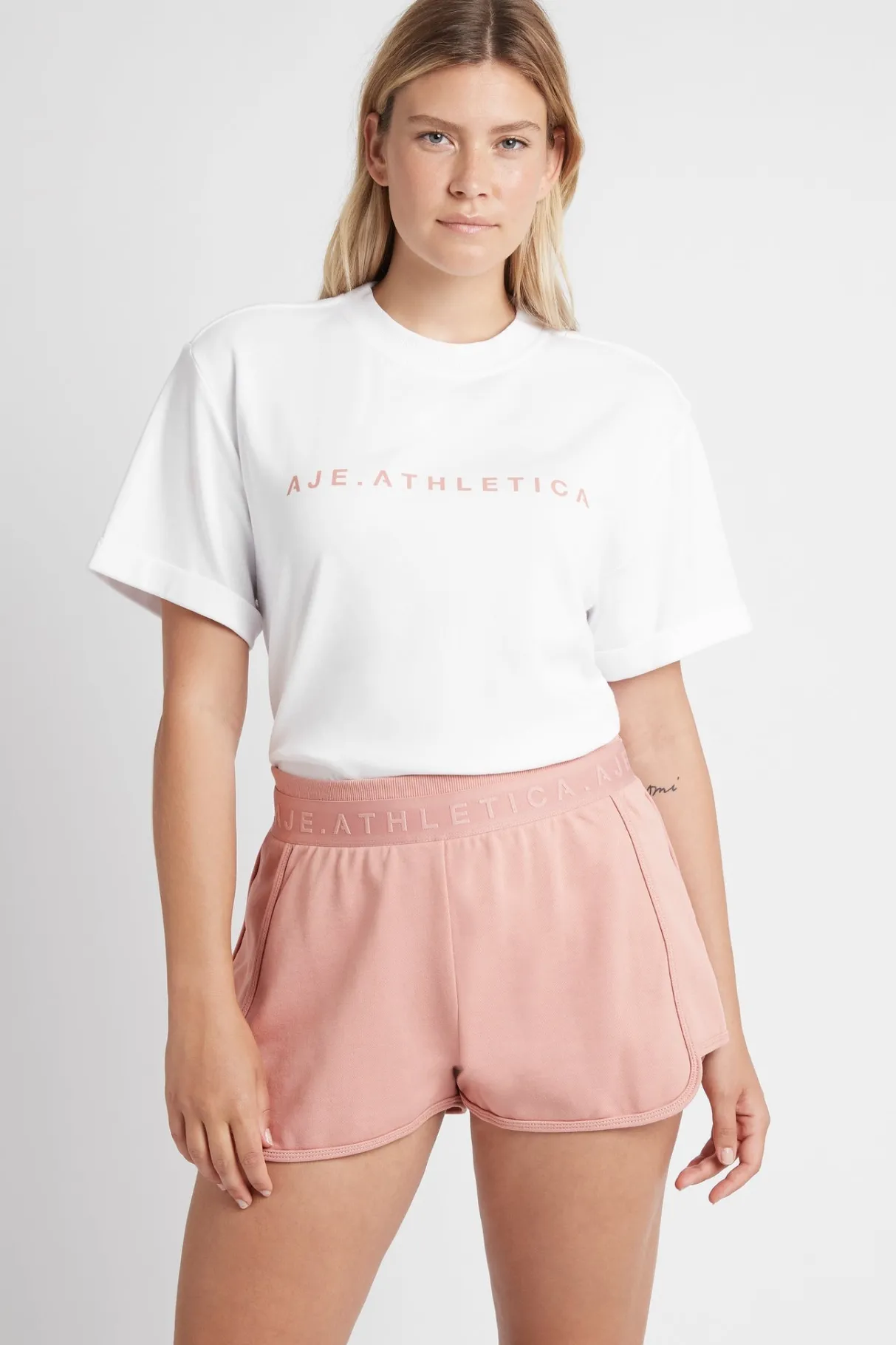 logotape_sweat_shorts__5-1.webp Shop Aje ATHLETICA Logotape Sweat Shorts 604 Sunset Pink
