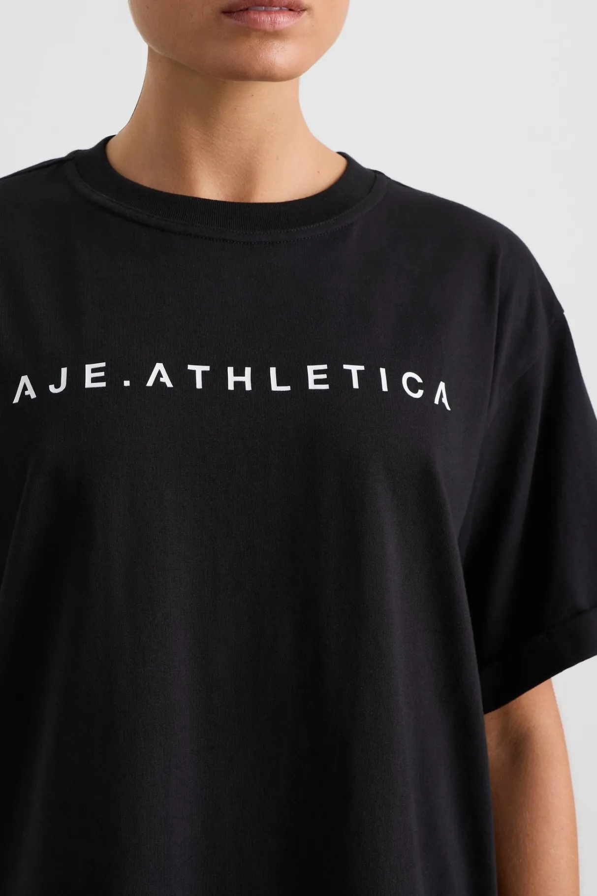 long_jersey_logo_tee__2.webp Discount Aje ATHLETICA Long Jersey Logo Tee 102 Black/White Logo