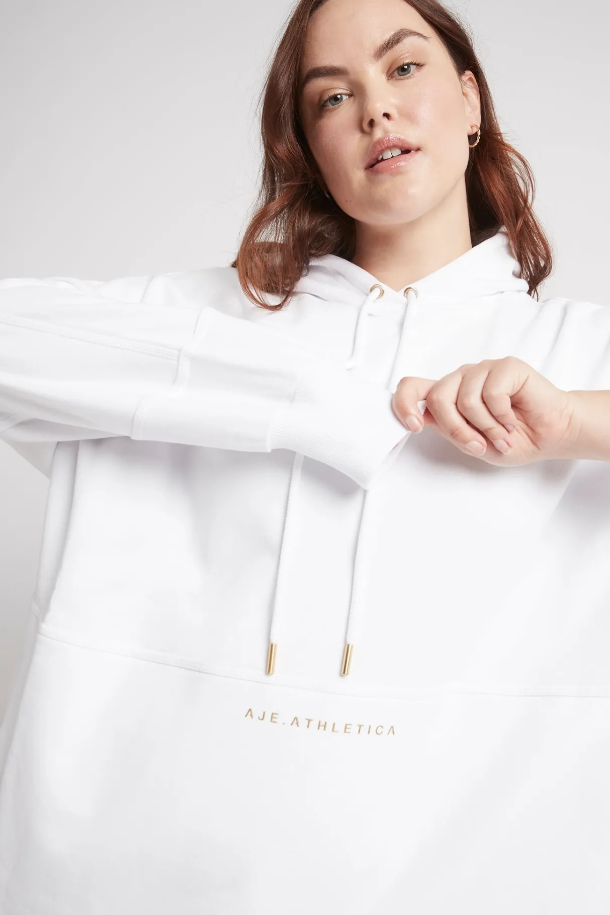 long_sleeve_hoodie_dress__13.webp New Aje ATHLETICA Long Sleeve Hoodie Dress 804 White/Gold