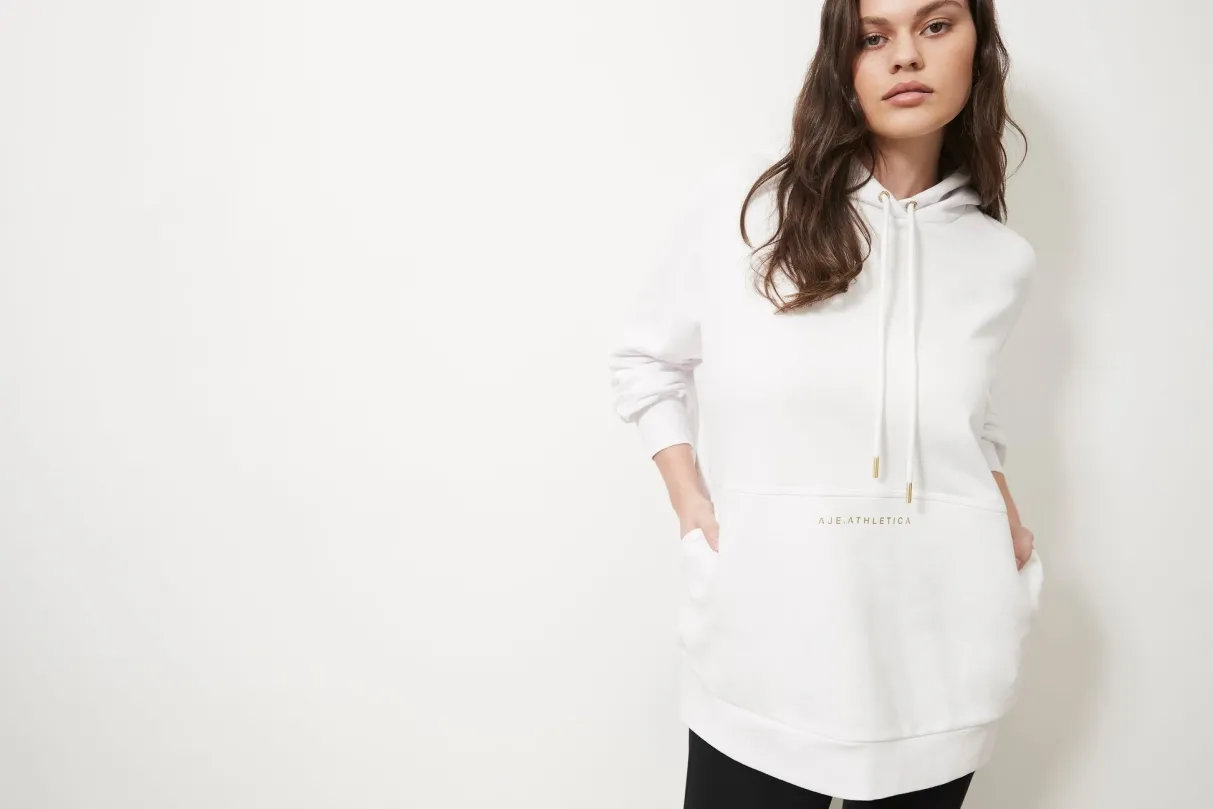 long_sleeve_hoodie_dress__16.webp New Aje ATHLETICA Long Sleeve Hoodie Dress 804 White/Gold