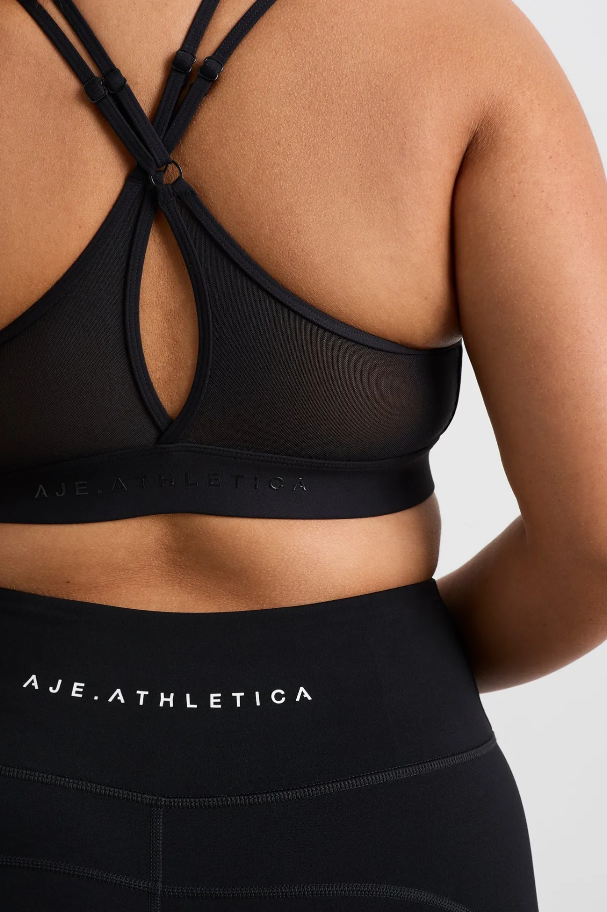 mesh_back_sports_bra__7-1.webp Fashion Aje ATHLETICA Mesh Back Sports Bra 338 Black