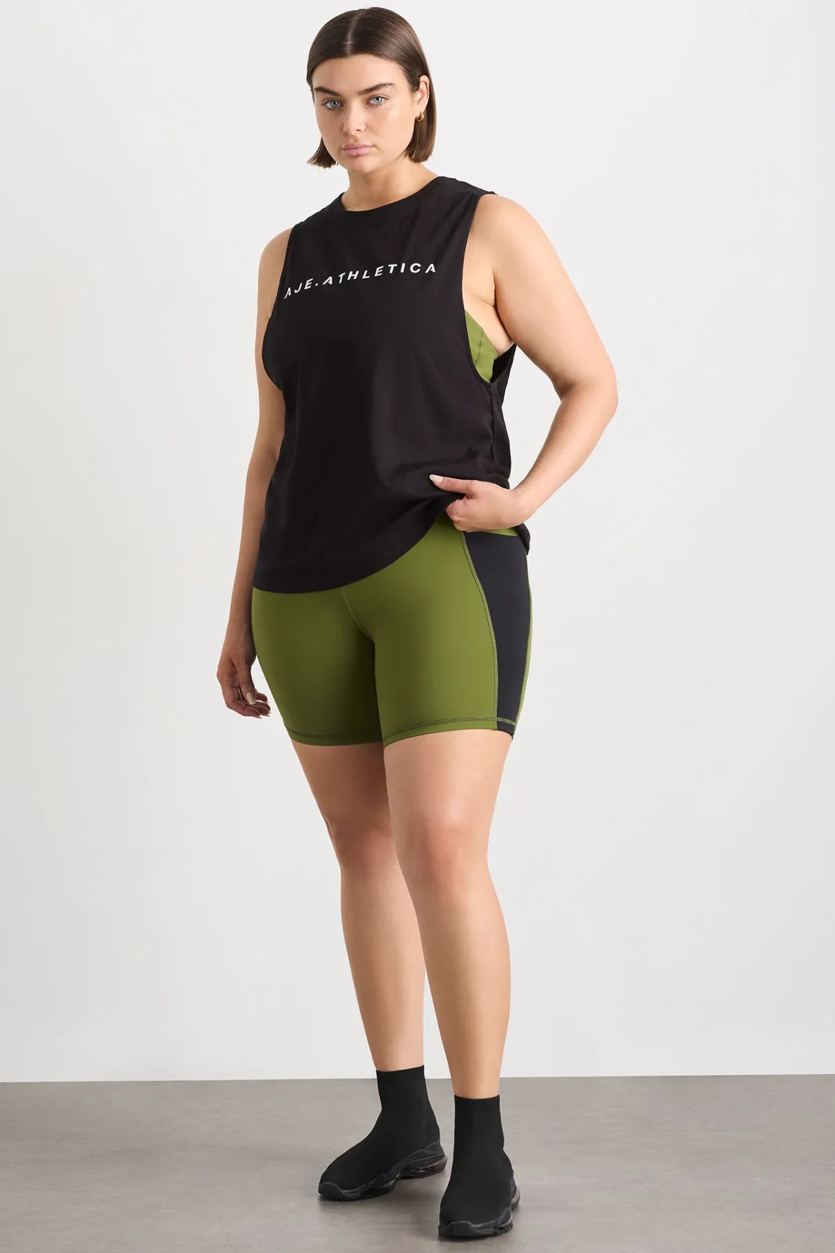 mid_length_bike_short__13.webp Sale Aje ATHLETICA Mid Length Bike Short 606 Evergreen Black