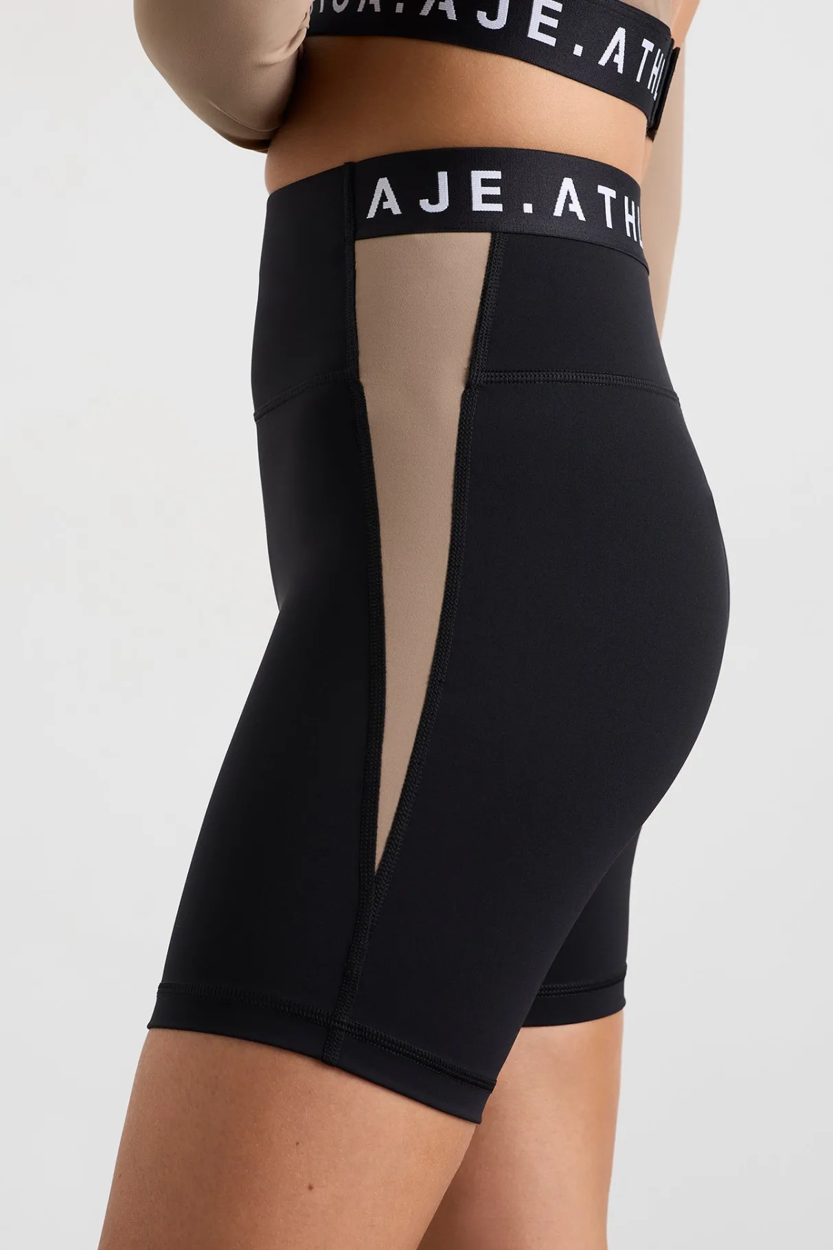 mid_length_logo_bike_short__3-1.webp Best Aje ATHLETICA Mid Length Logo Bike Short 250 Black/Dune