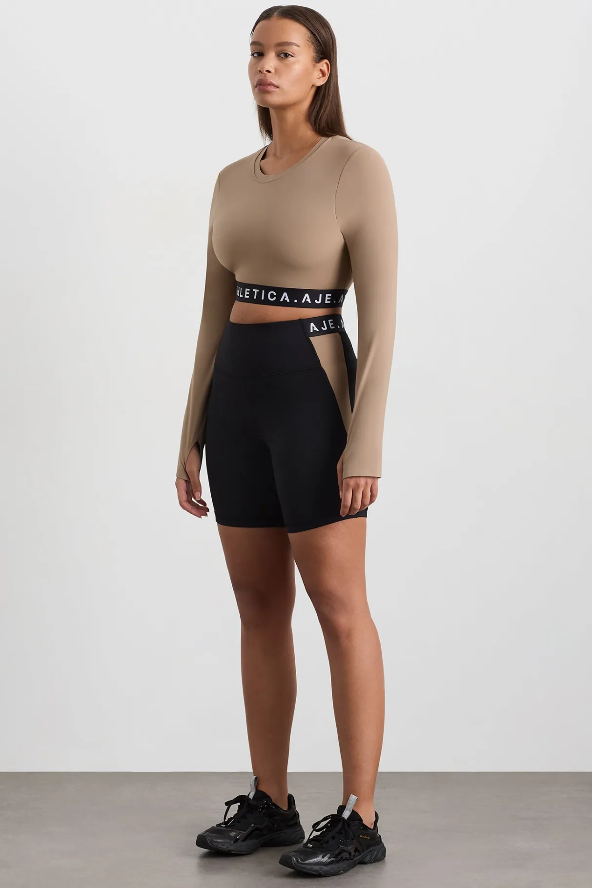 mid_length_logo_bike_short__5-1.webp Best Aje ATHLETICA Mid Length Logo Bike Short 250 Black/Dune