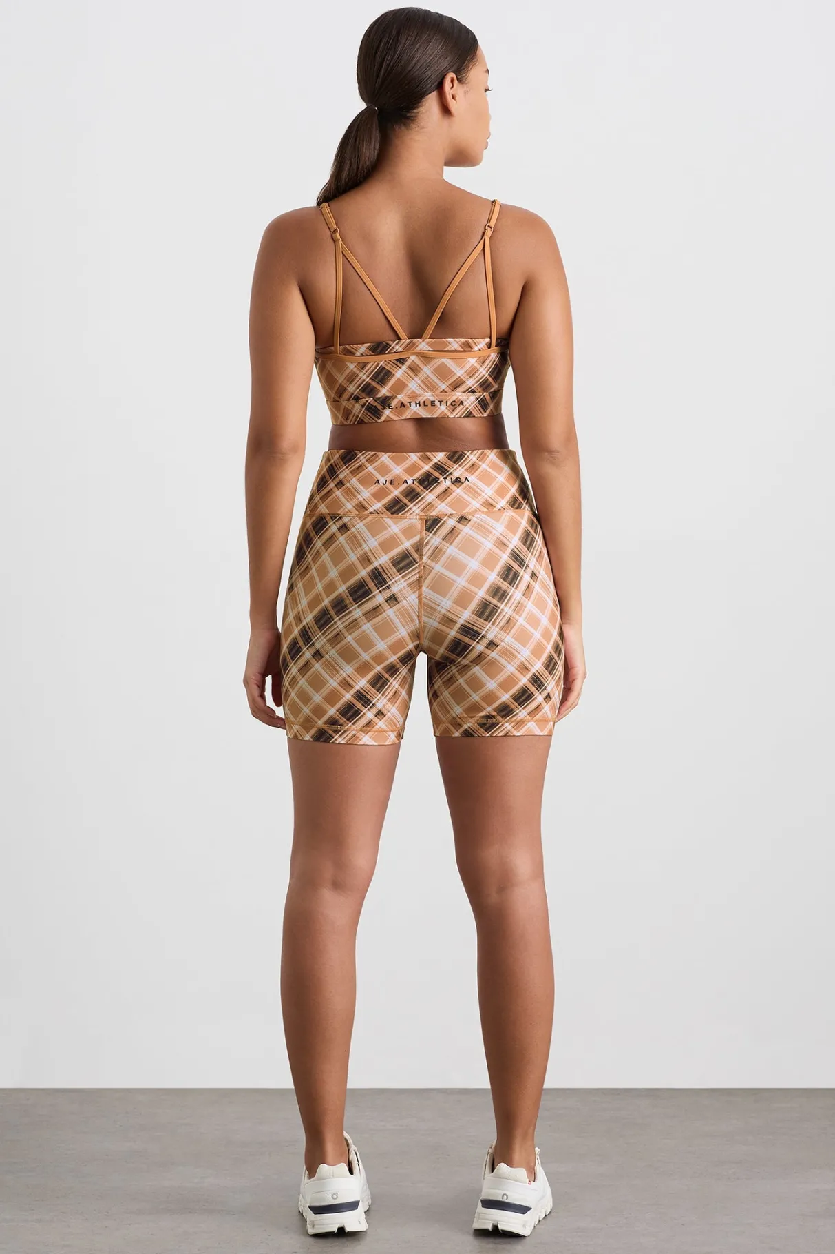 multi_strap_sports_bra__11.webp Shop Aje ATHLETICA Multi Strap Sports Bra 363 Blurred Tan Check
