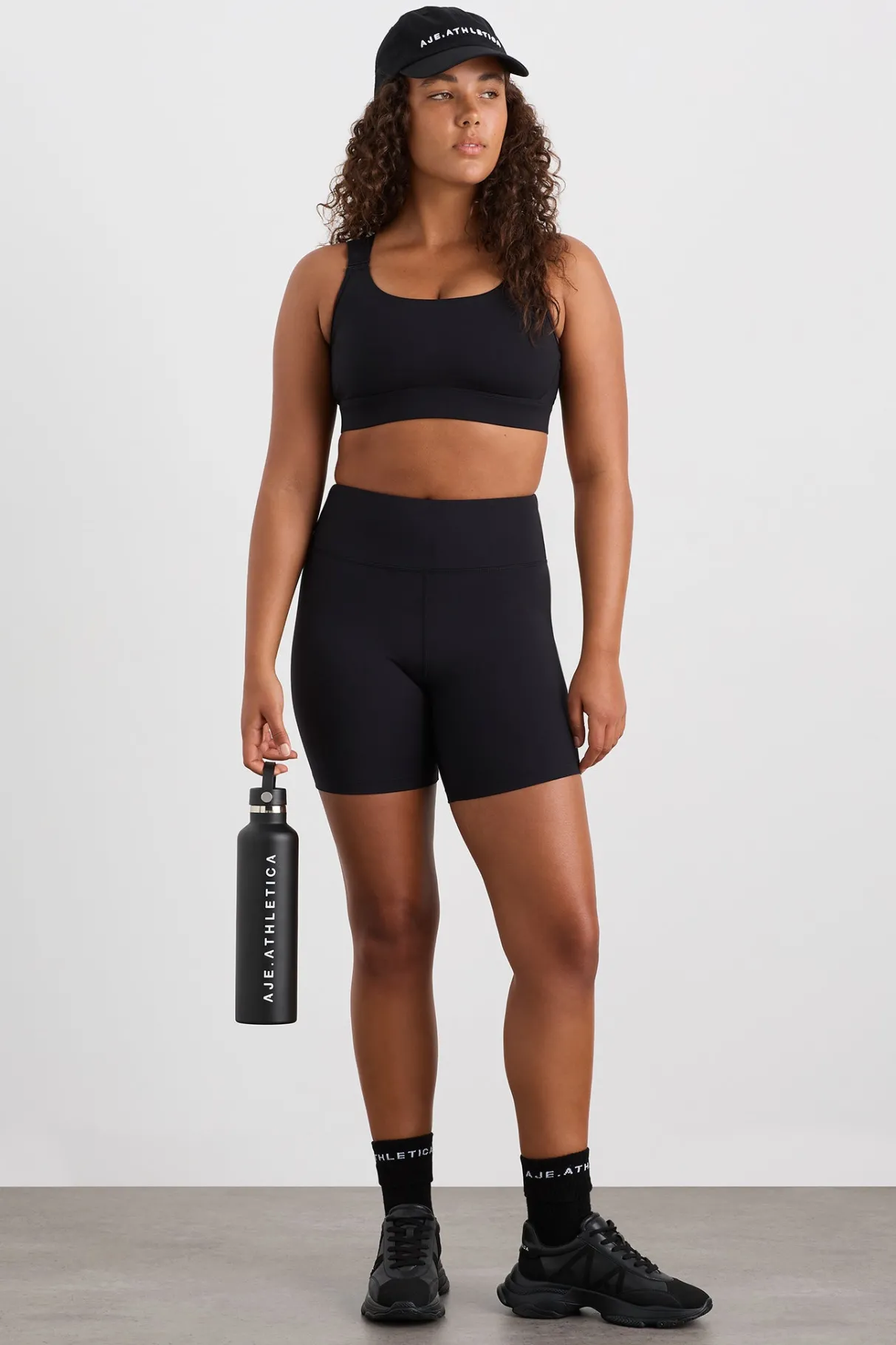 peached_mid_length_bike_short__7.webp Fashion Aje ATHLETICA Peached Mid Length Bike Short 601 Black